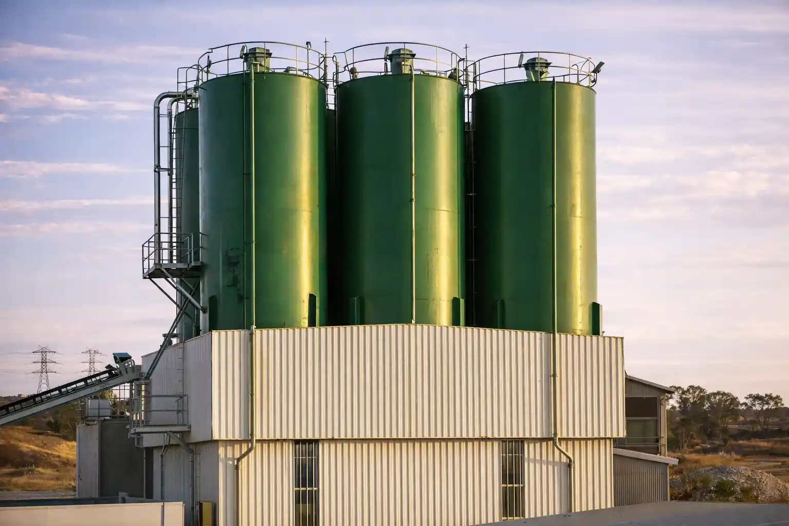 Cement storage silos at an industrial concrete production facility