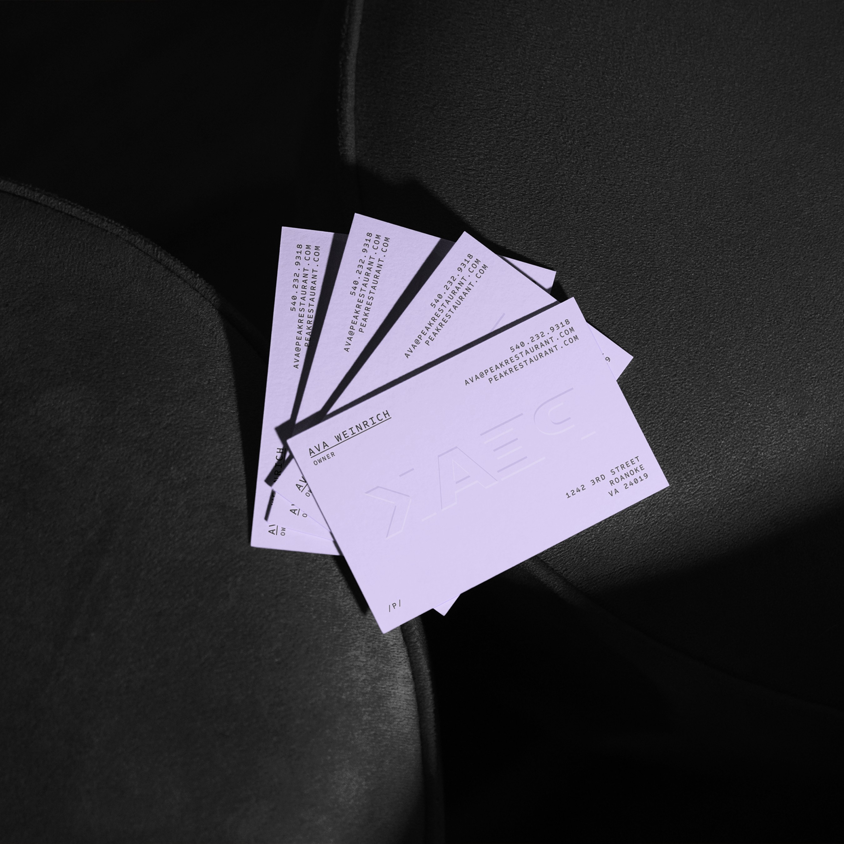 Streetside billboard with flyposters of the Batch.Works brand and illustrations