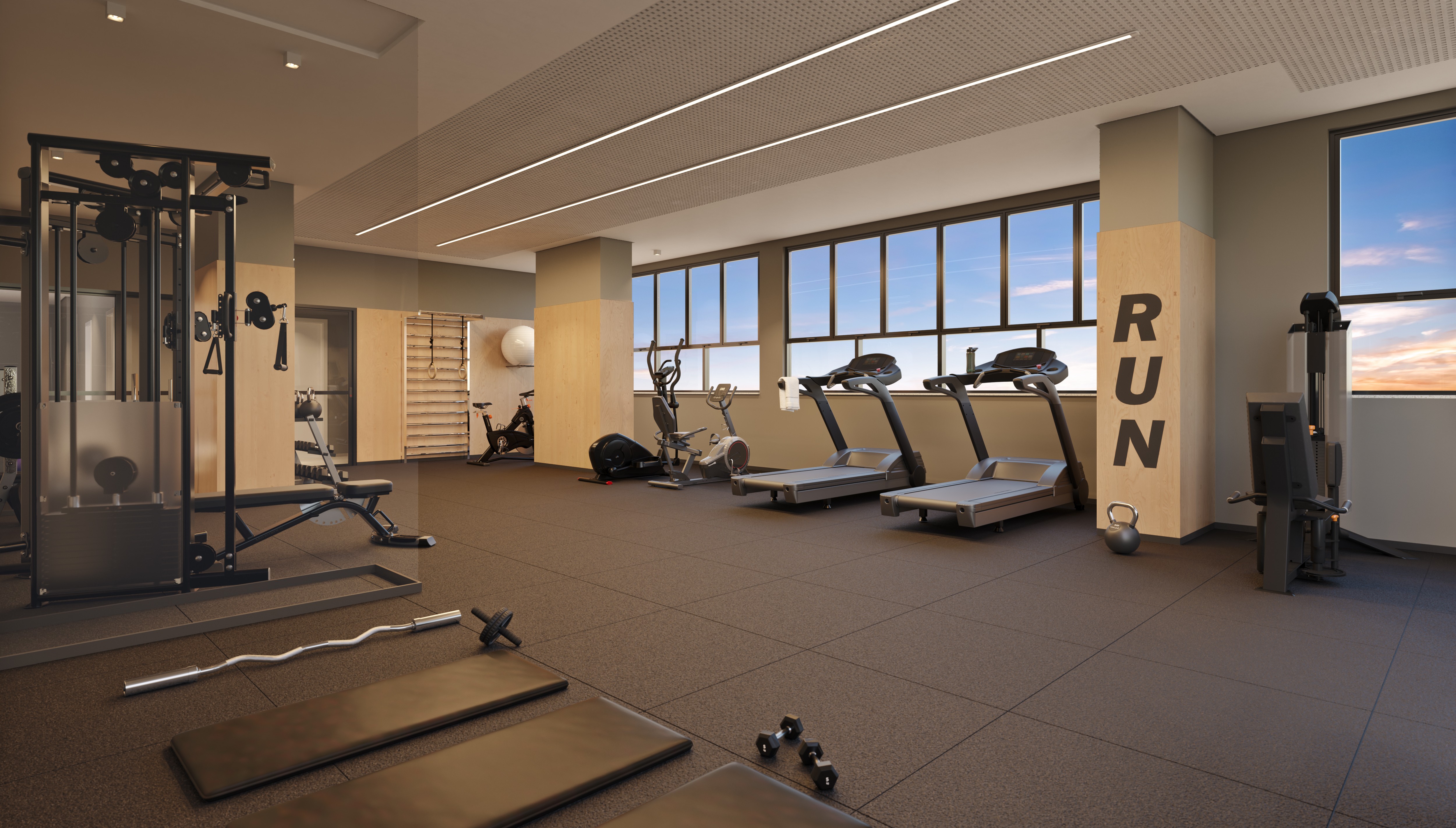 Curved modern skyscraper against a clear blue sky.