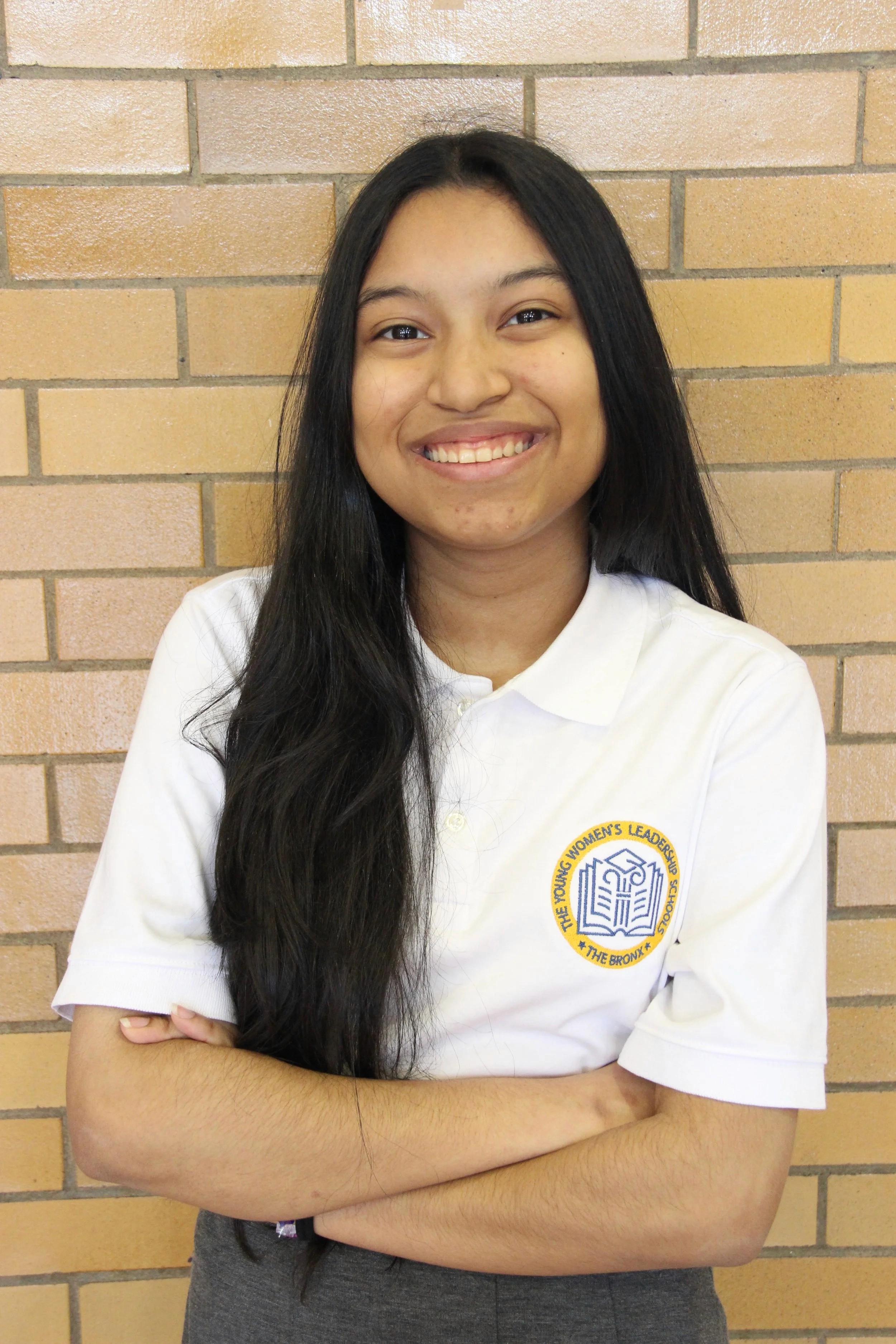 image of man wearing glasses folding his arms
