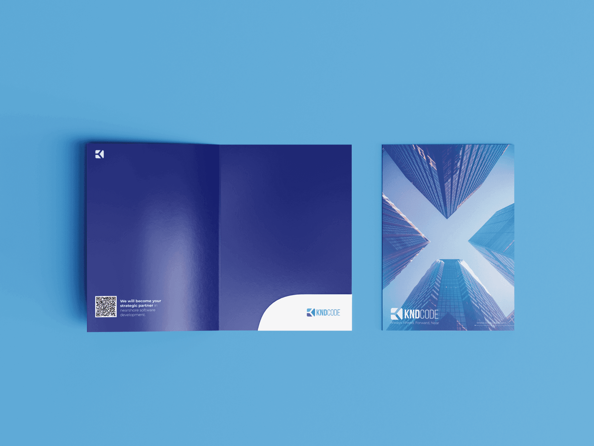 Printed marketing folder and flyer with the updated blue brand system.