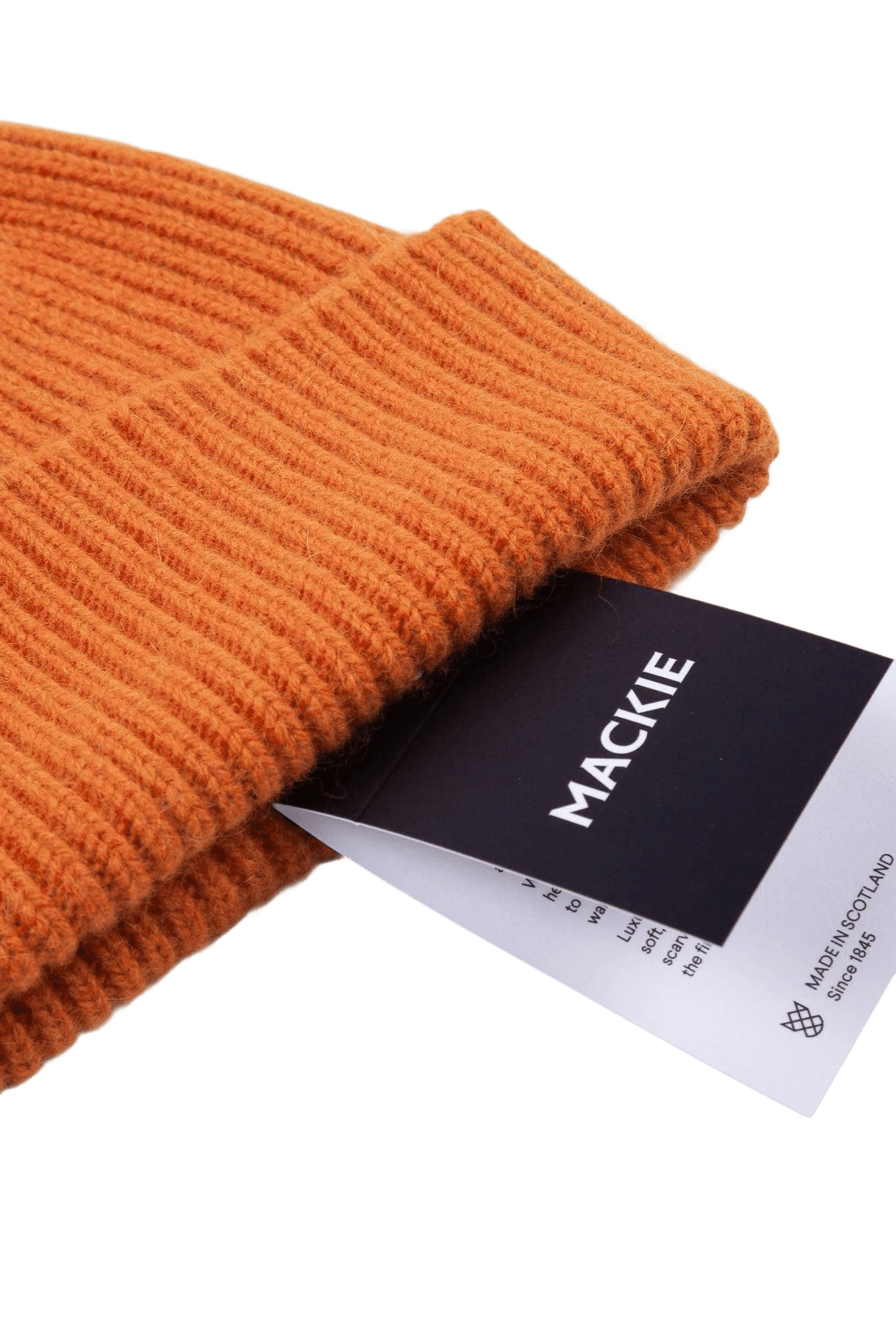 close up shot of an orange beanie