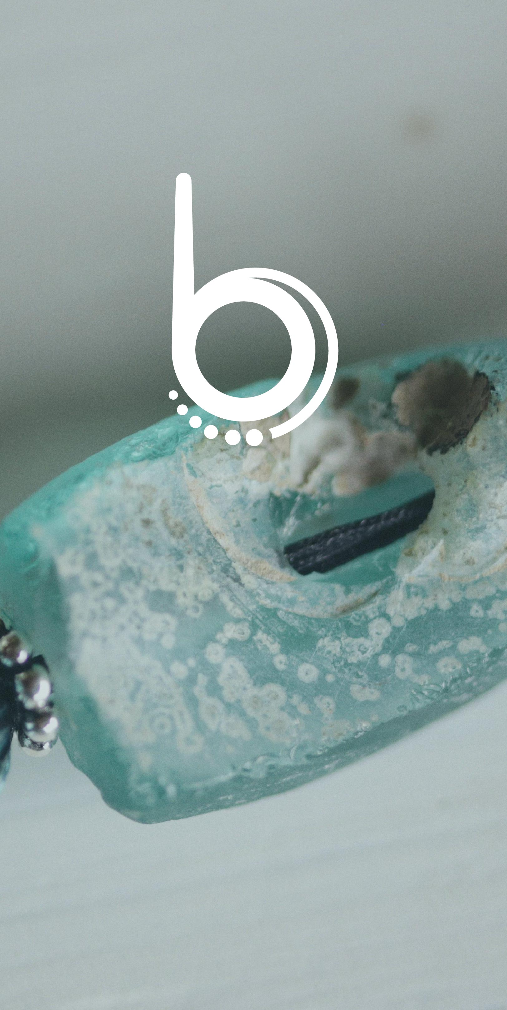 Batch.Works logo over a photo of a box of 3D printed objects