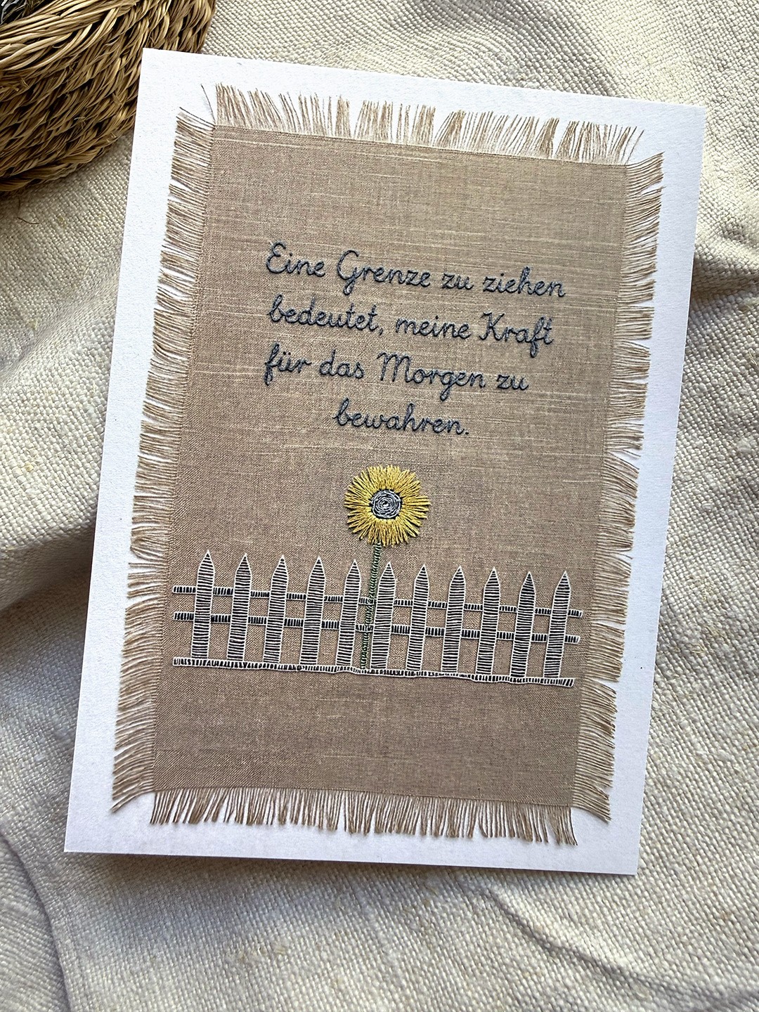 A Card with a embroidered Text