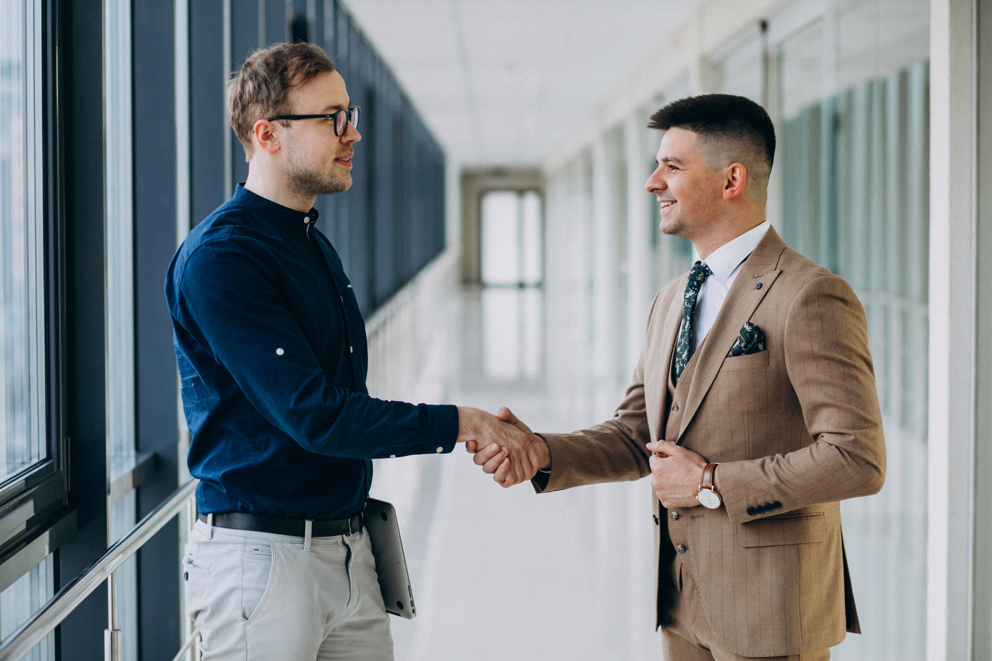 two men shaking hands