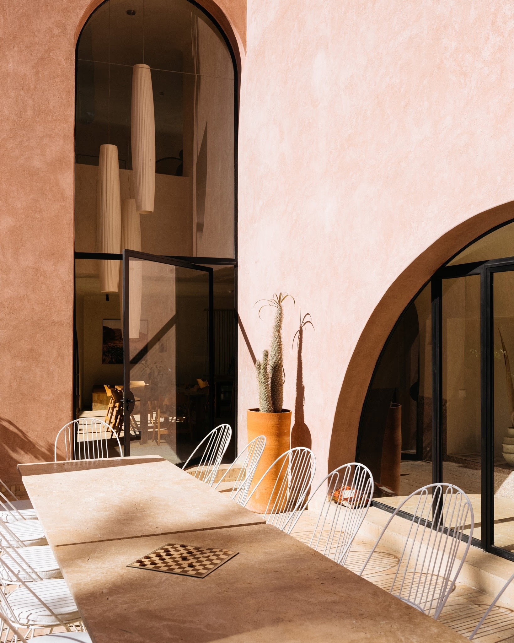 Streetside billboard with flyposters of the Batch.Works brand and illustrations