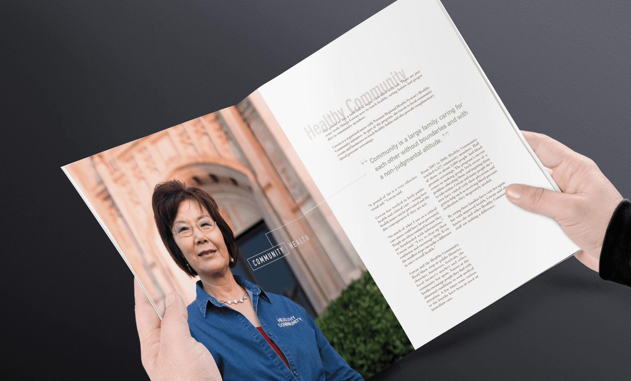 Pages of a book with an Asian woman with glasses wearing a blue denim shirt and wearing glasses