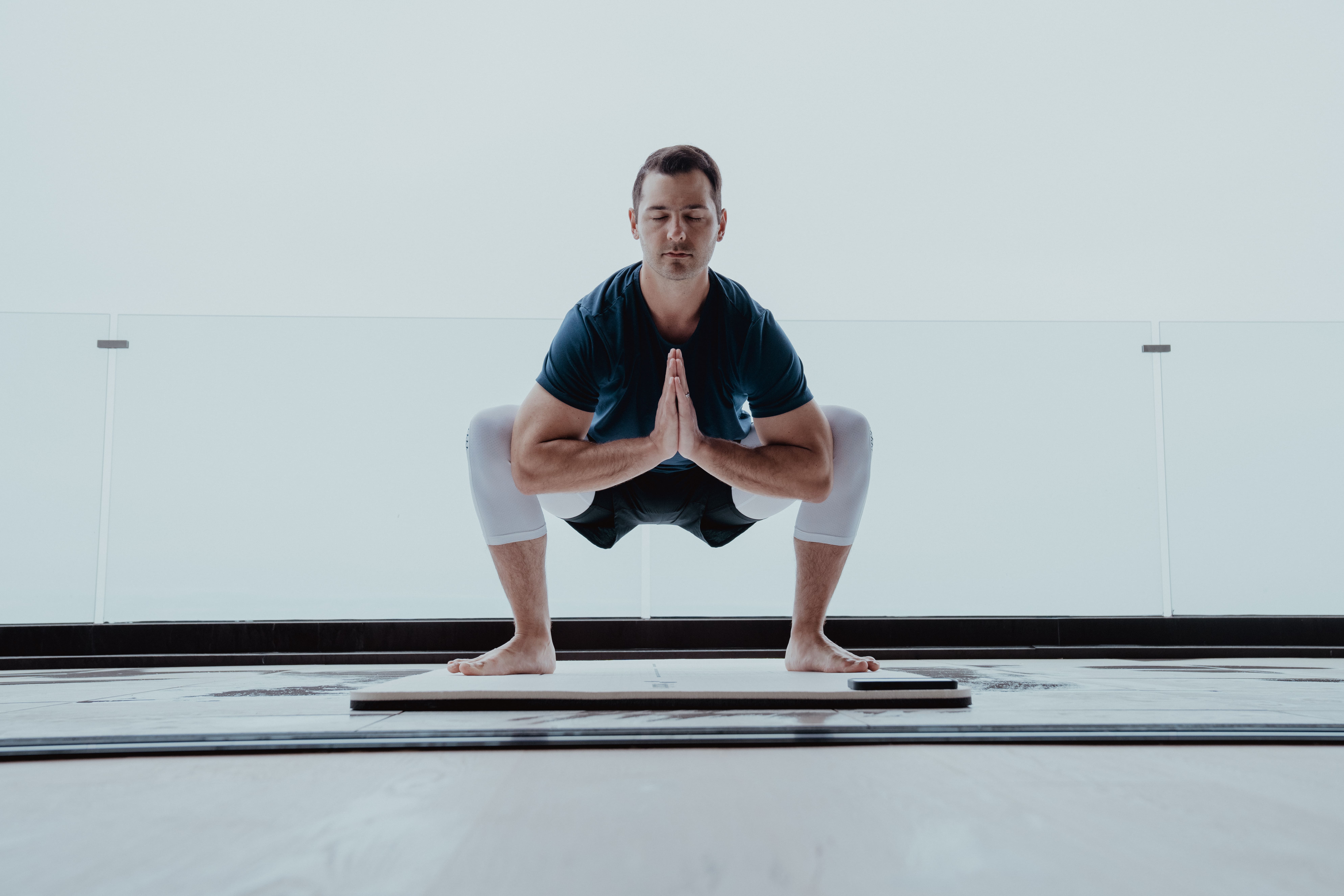 person in yoga position - Breathing Exercises for Athletes