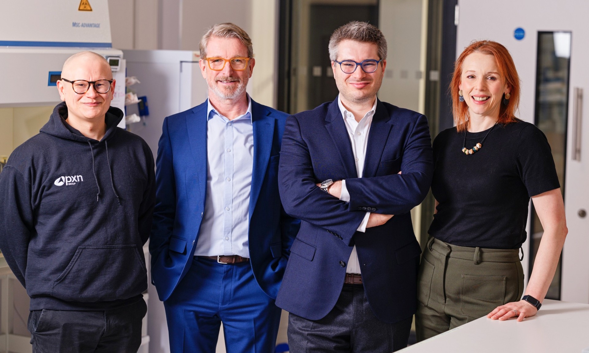 A photo of the QV Bioelectronics team standing in a line