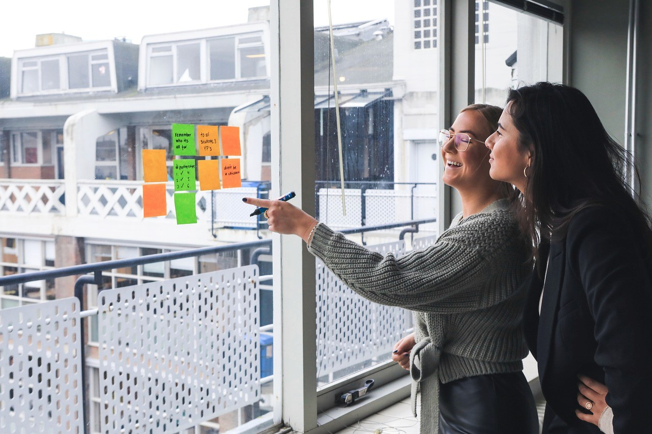 Two women happy at work