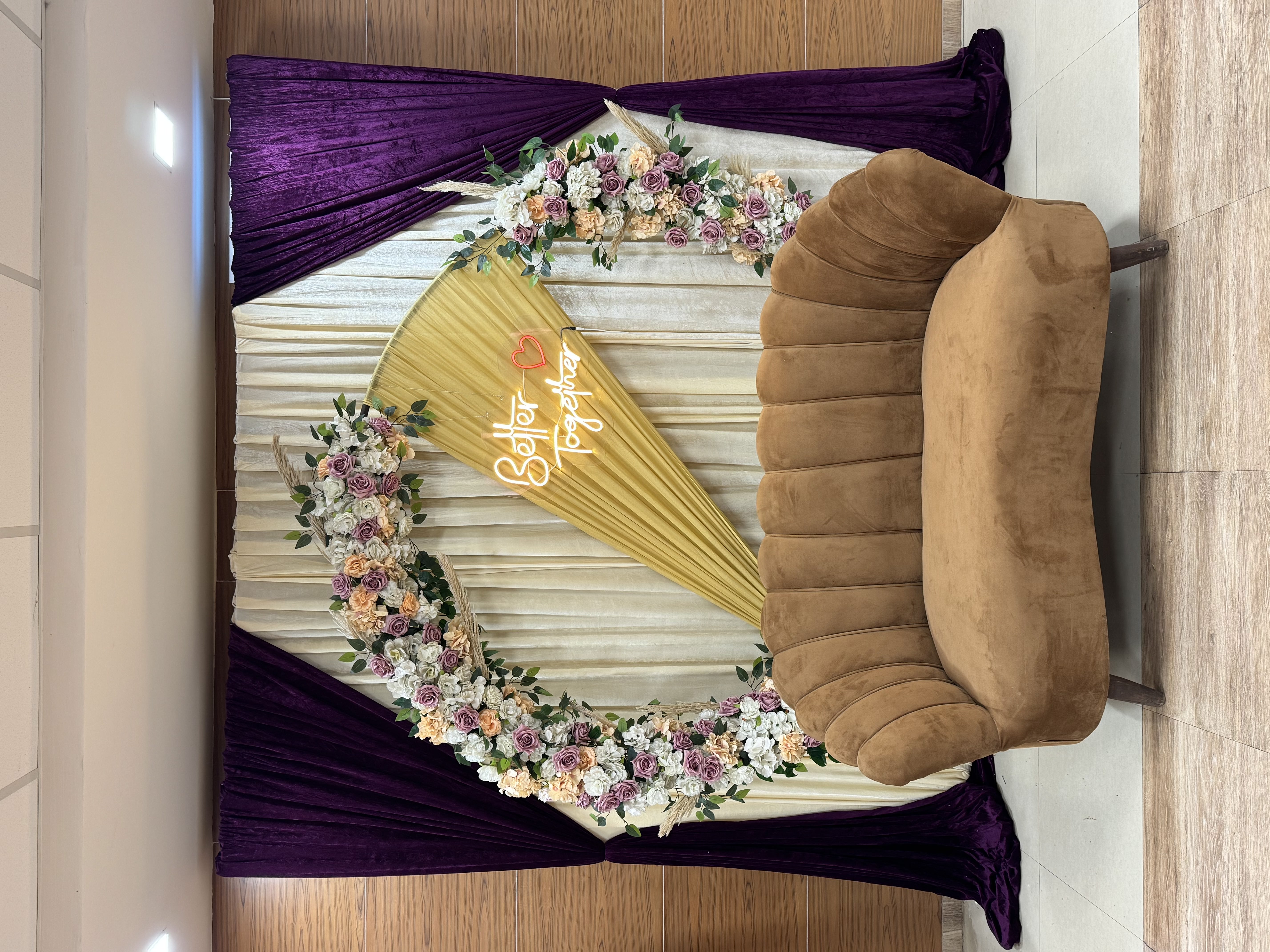 Aesthetic engagement decor in Delhi NCR with cream, gold & purple velvet drapes by Decori near Janakpuri, Pitampura & Rajouri