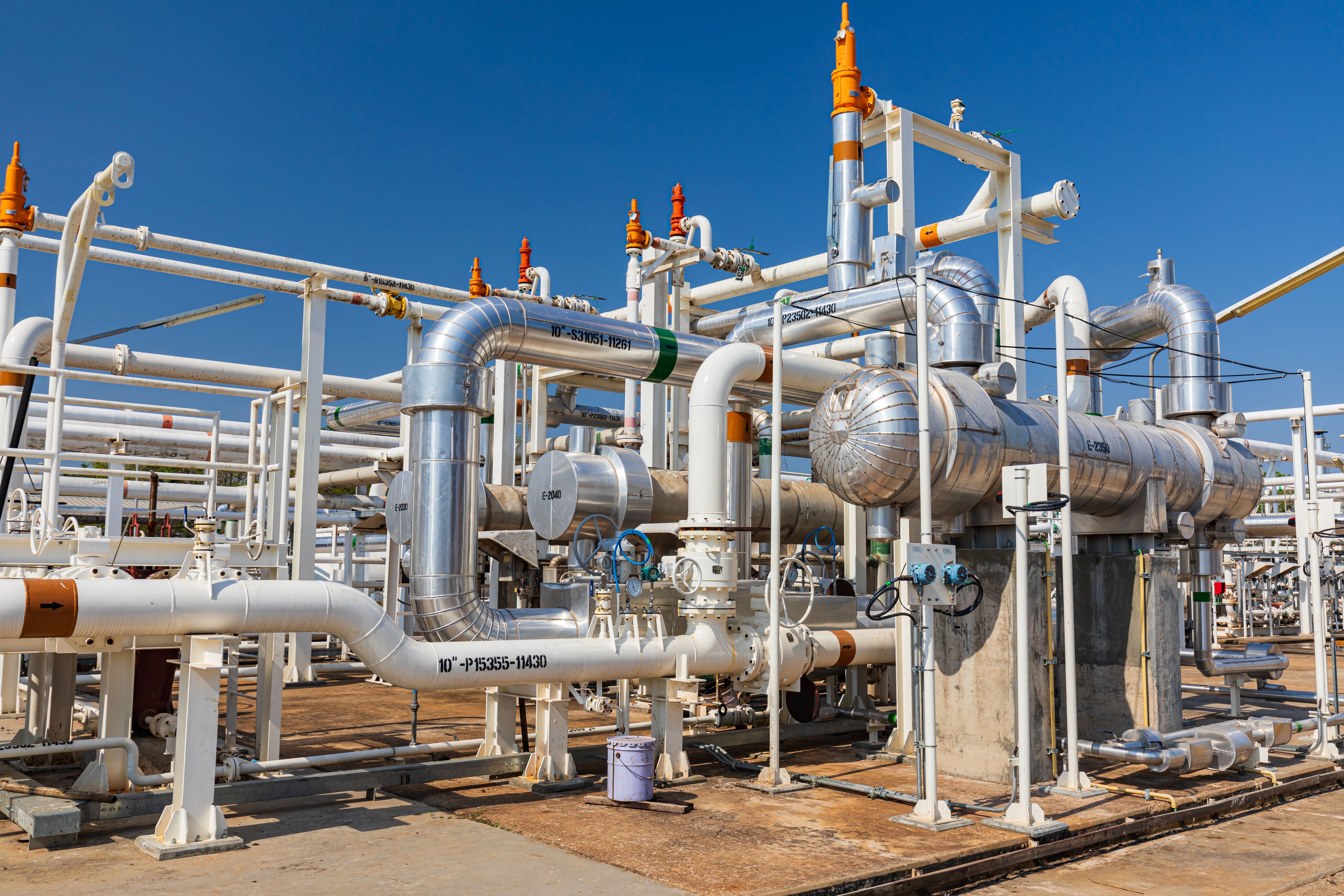 Pipeline construction in a remote area with welding crews and machinery