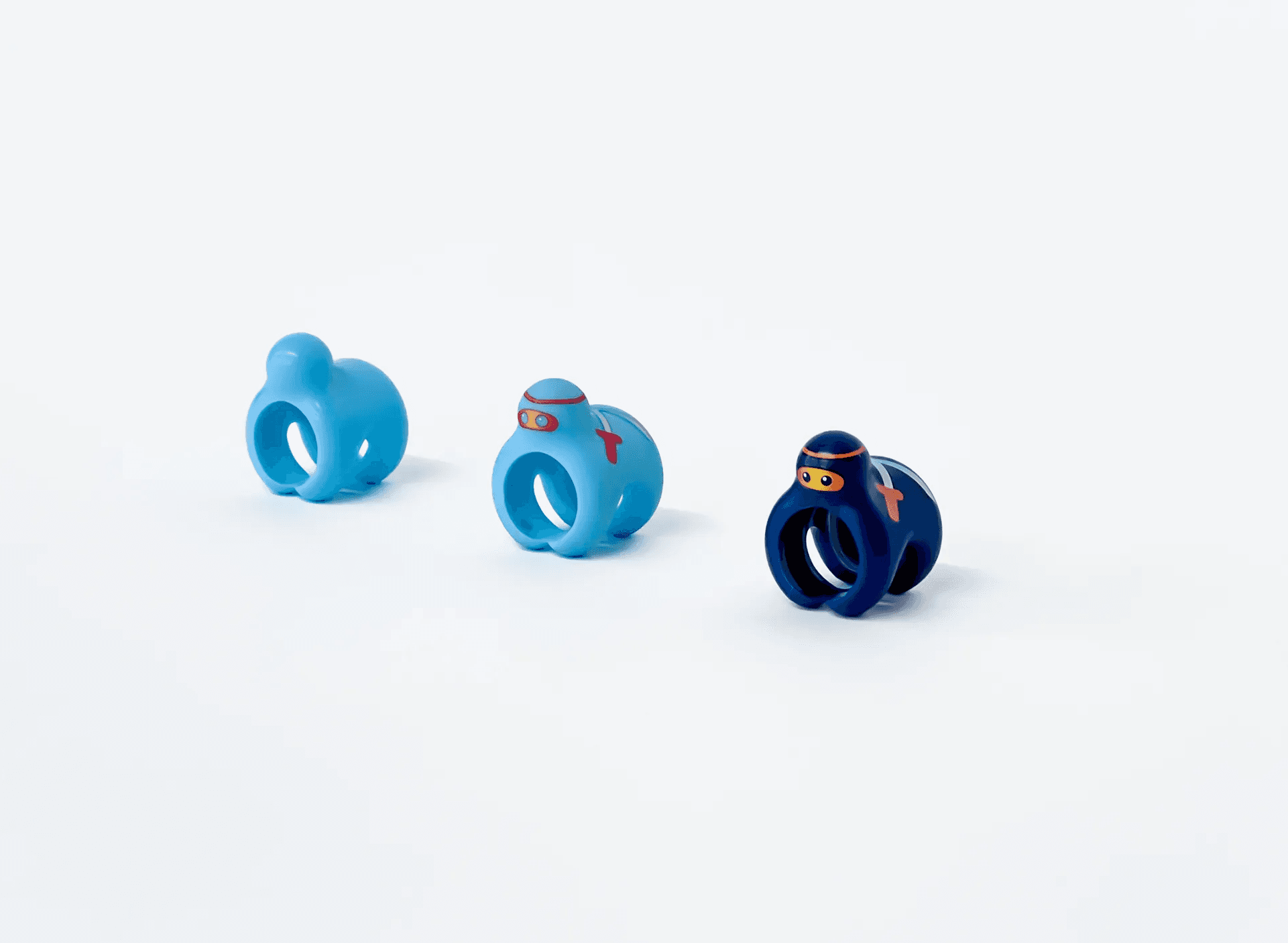 Three BABSY recycled-plastic component prototypes in blue color variations