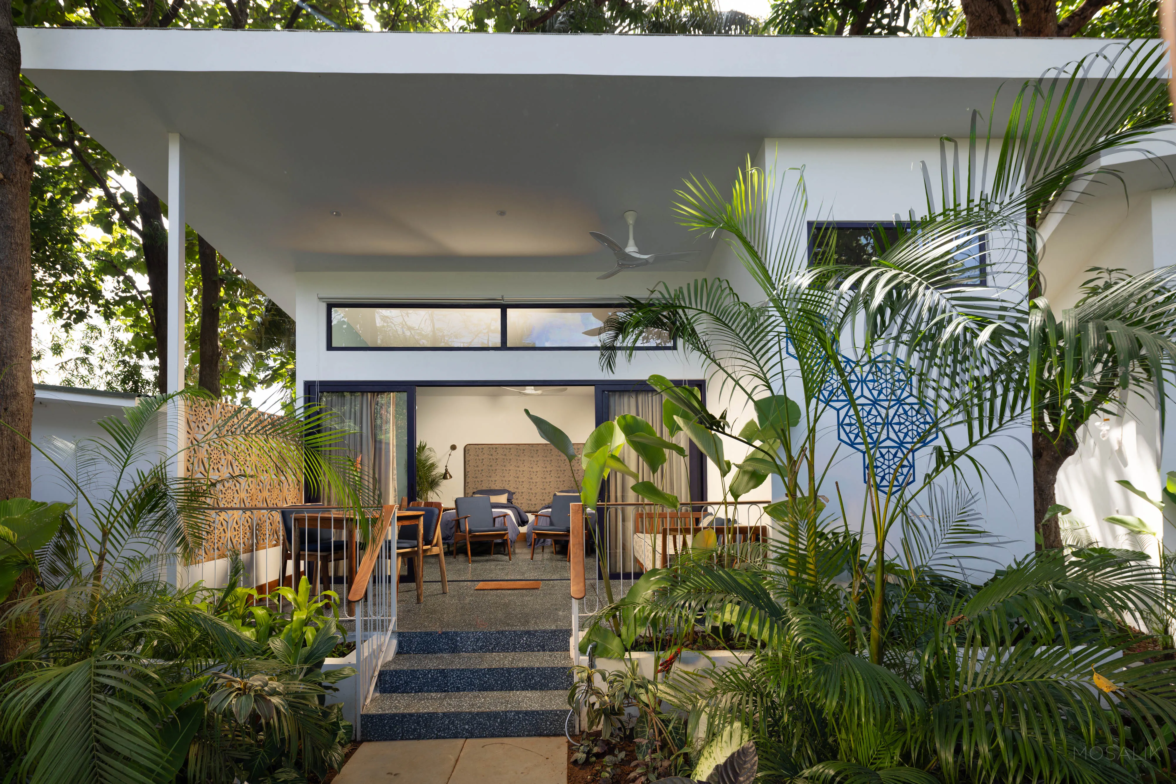 Steps up to the garden rooms at Jaali Blue