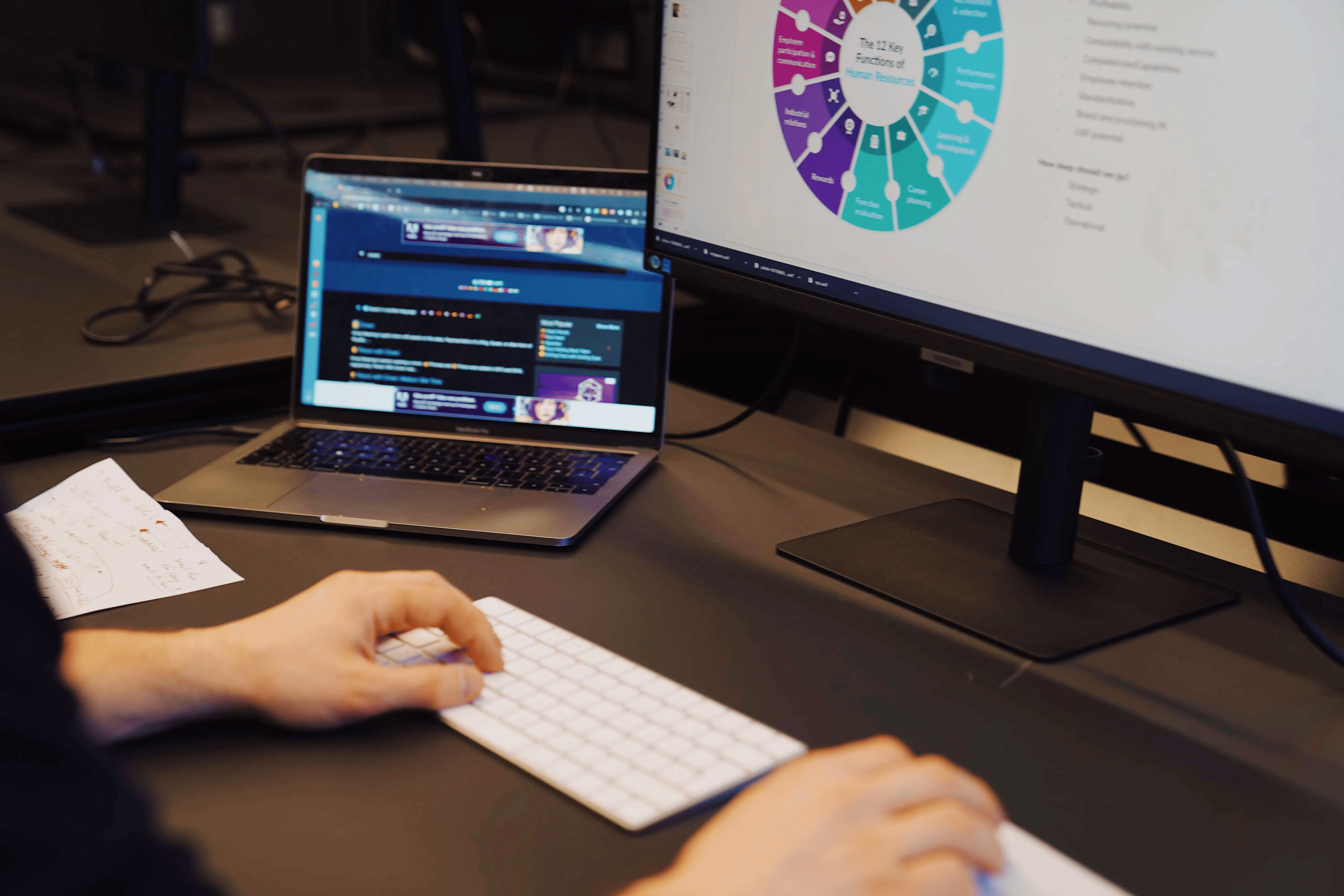 Person working remotely on laptop in office for recruiters highlighting hybrid work