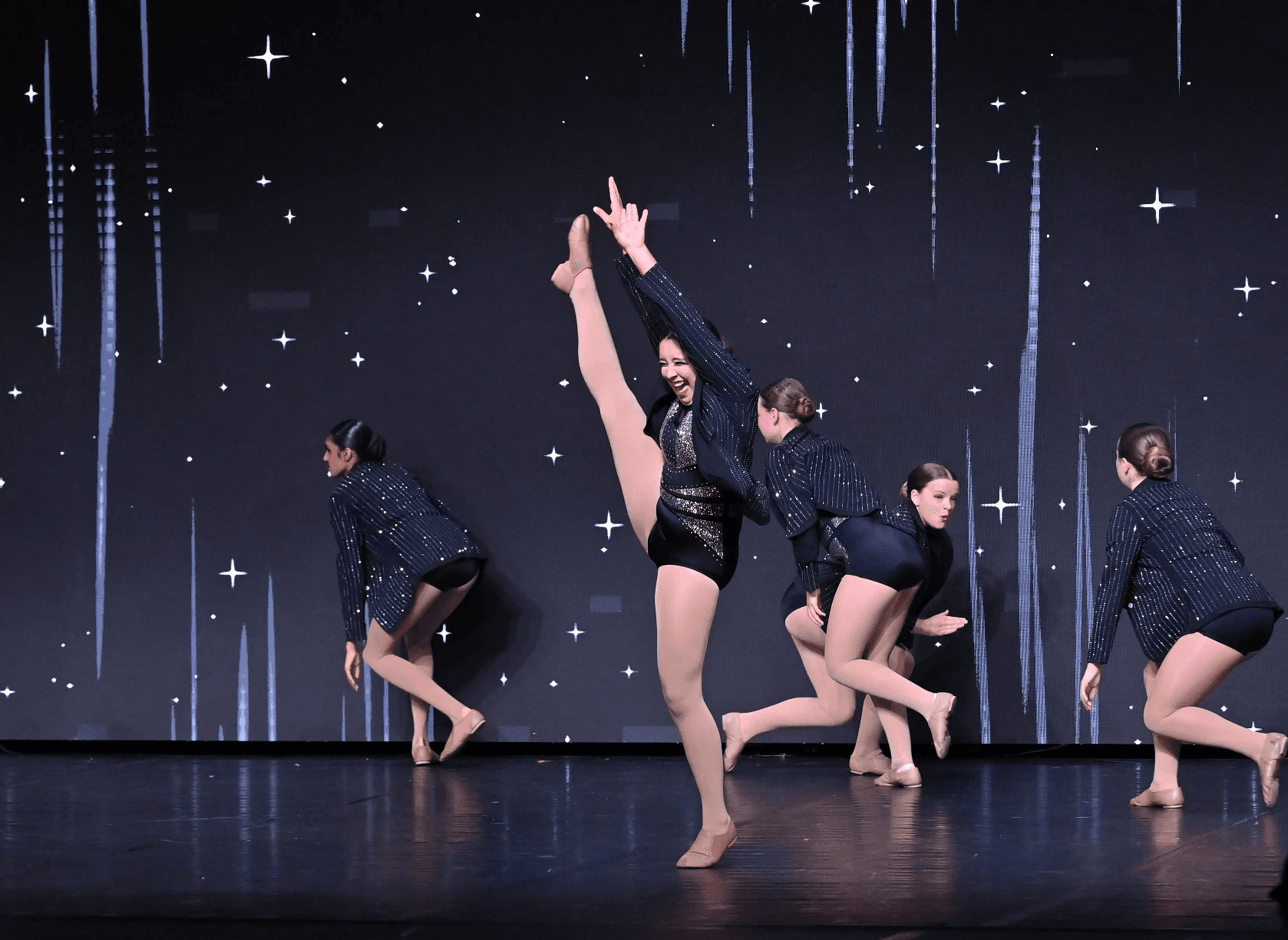 group of people performing on stage