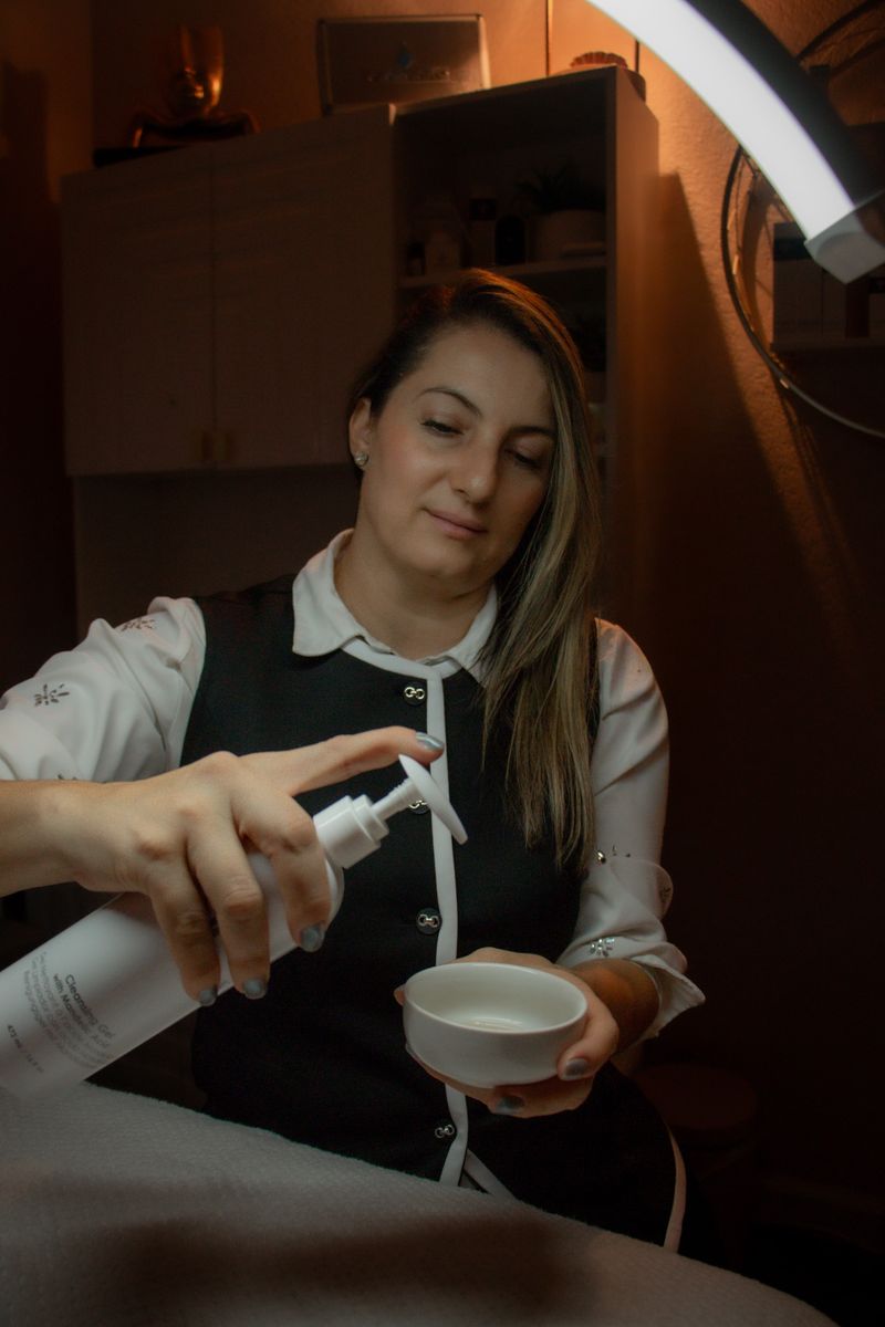 Therapist using cupping tool on back