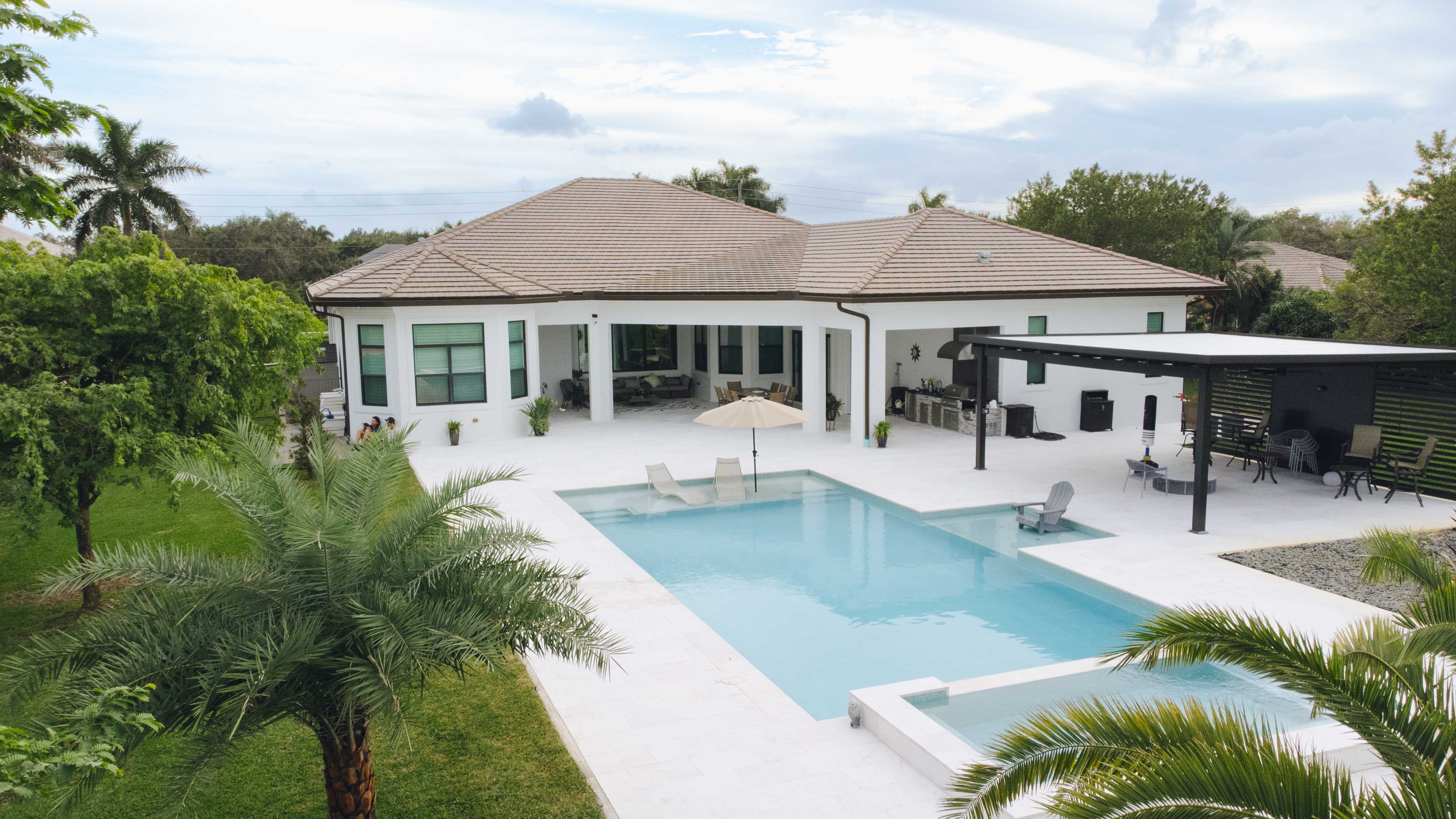 Spacious modern house with large pool and patio area in Florida.