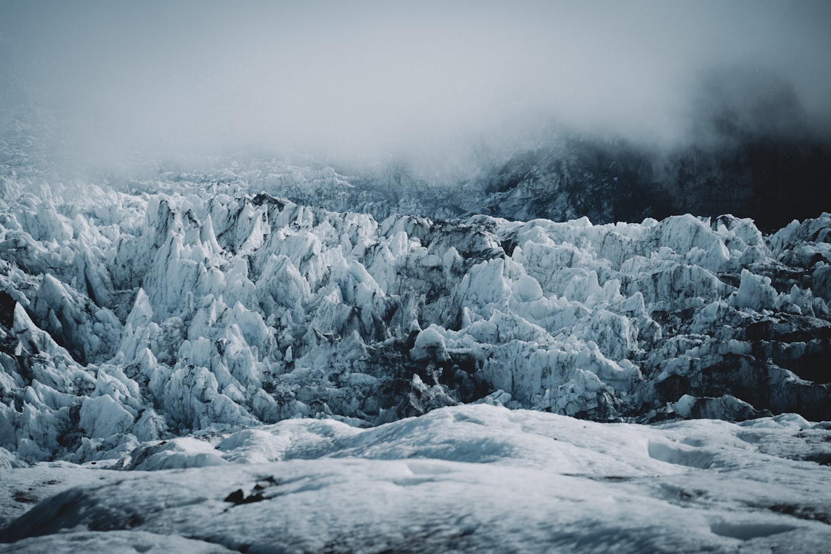 iceland glacier hiking on snow-covered volcanic slope