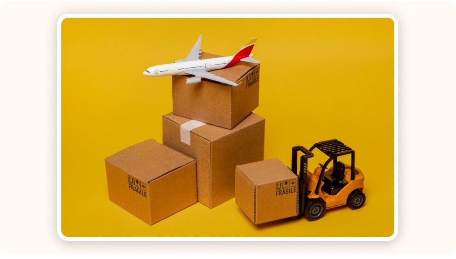 Boxes with airplane and forklift illustrating shipping and logistics transport