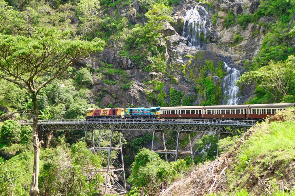 a train travels down the tracks