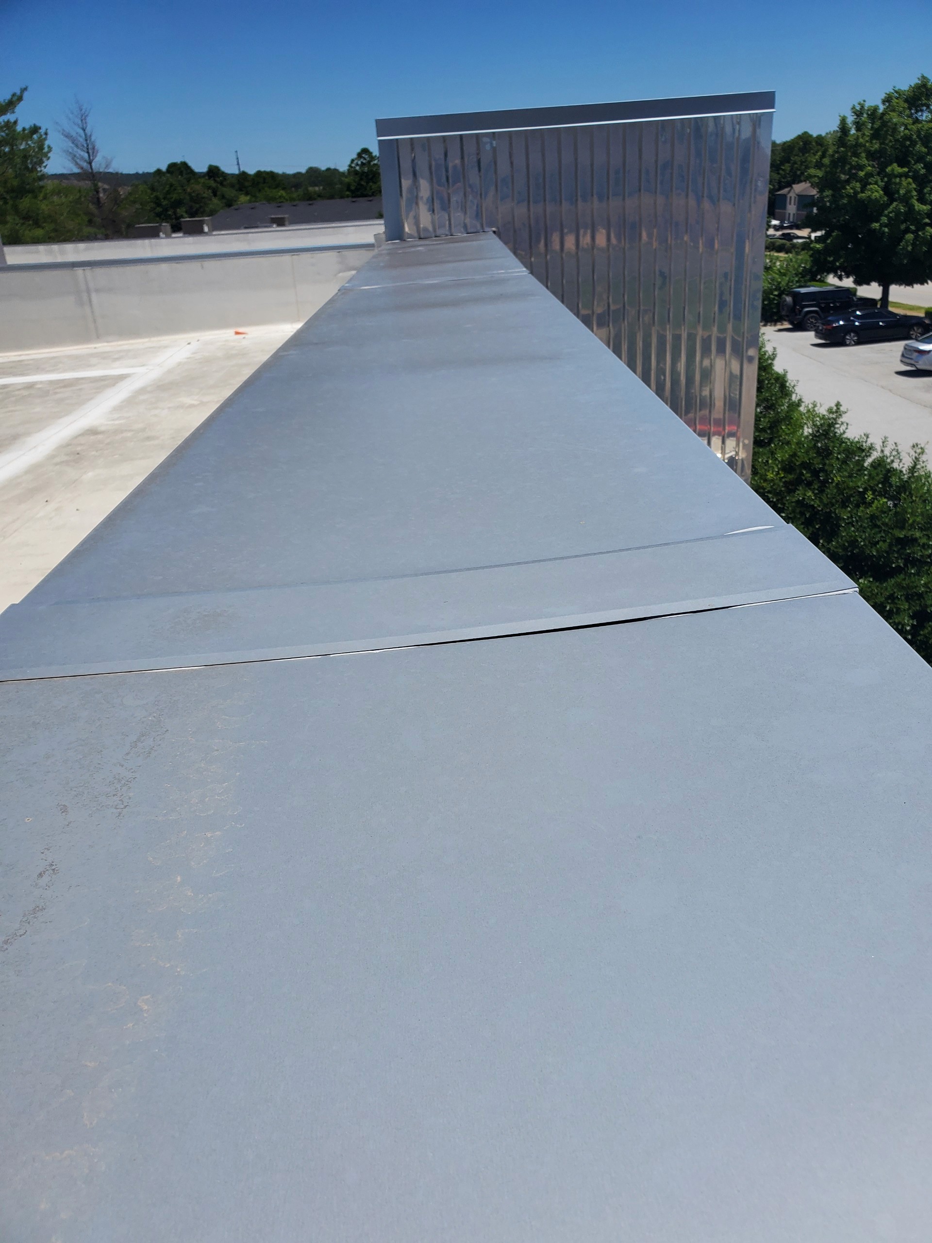 Commercial Roofing - TPO Roof Re-sealing Cap that was leaking 