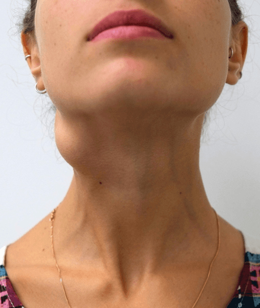 smiling happily caregiver hugging her old