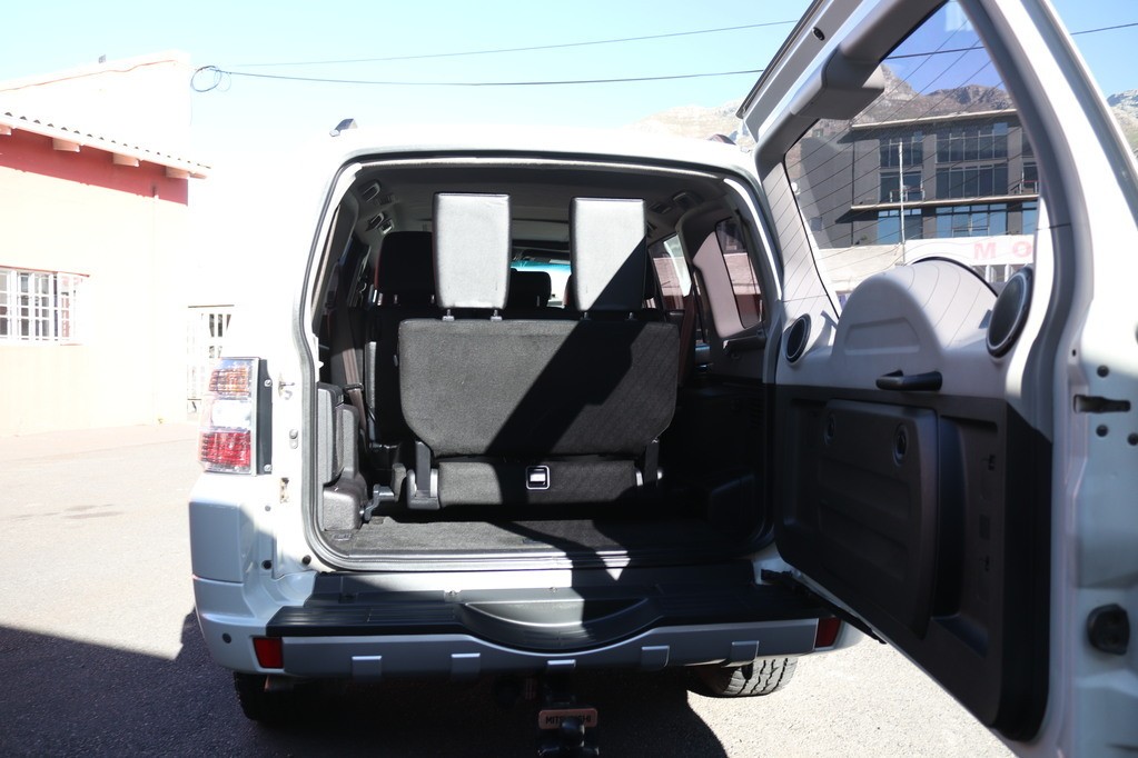 man in white crew neck shirt wearing black framed eyeglasses