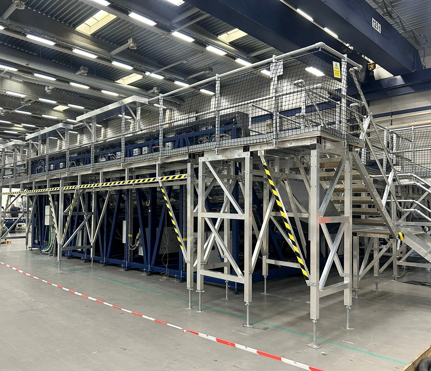 Image of a large scale platform with hand rails and edge protection