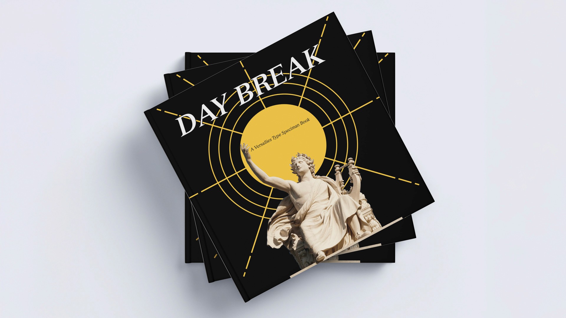 square books on a table, illustrations and the text Day Break