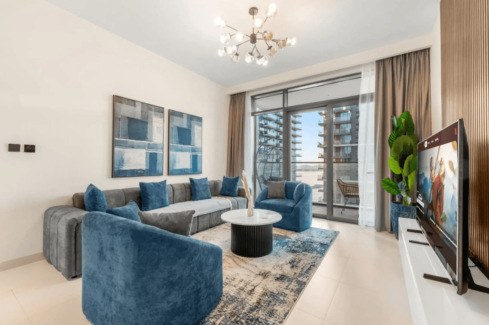 a living room filled with furniture and a mirror