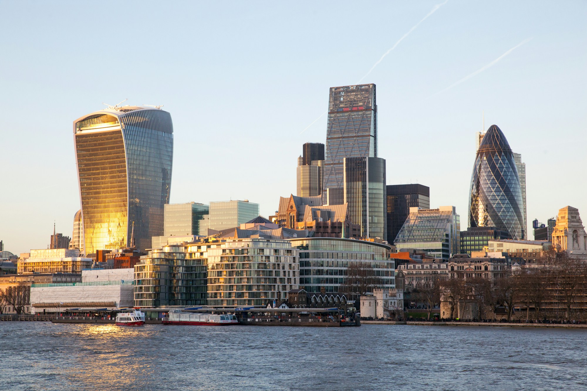 London skyline across the Thames in daylight