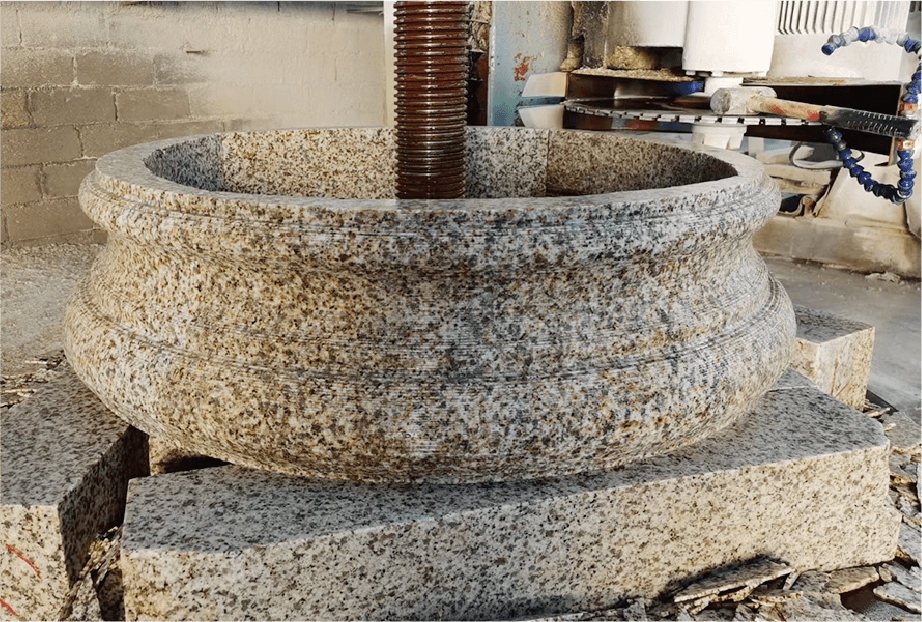 A finely crafted stone column cap produced by the Column Cap & Base Profiling Machine, illustrating the machine's capability to produce high-quality architectural elements.