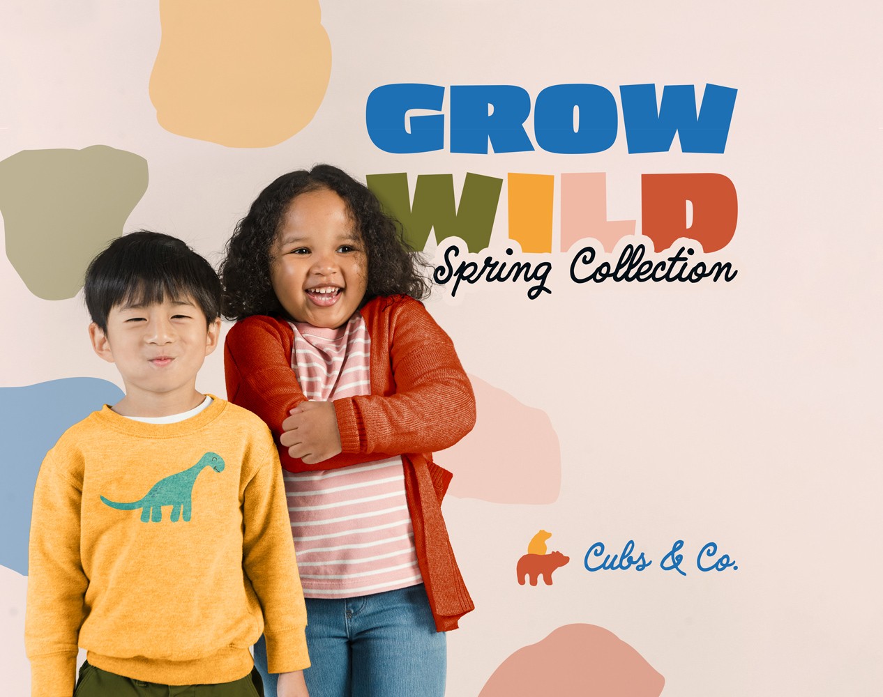 A campagne photo of "Grow Wild", 2 kids standing in the brand's clothes