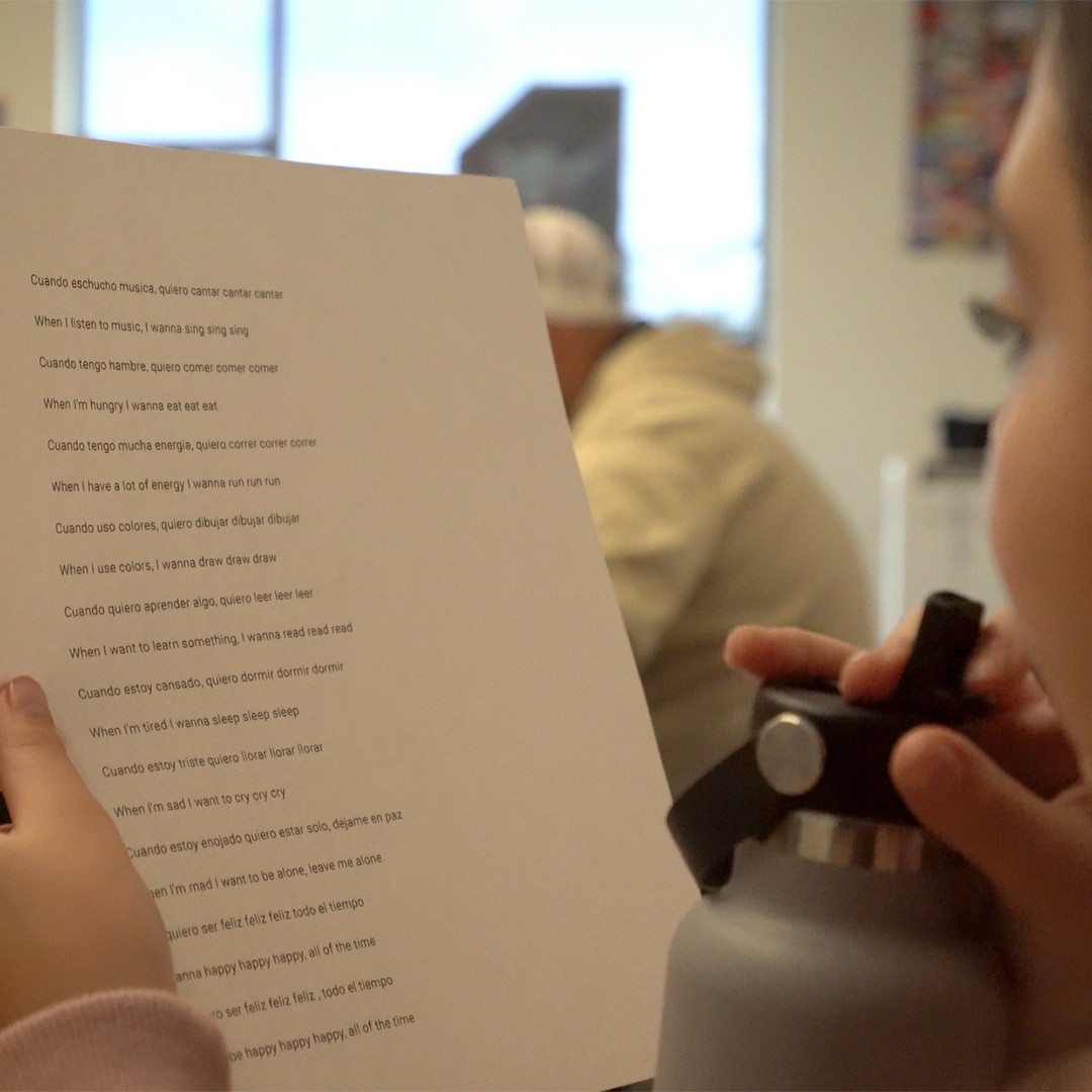 Students learning Spanish vocabulary in interactive after school language enrichment program