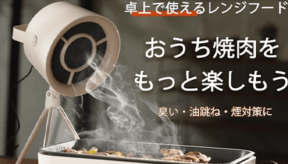 A large, dark futuristic spaceship flying over a glowing city at sunset