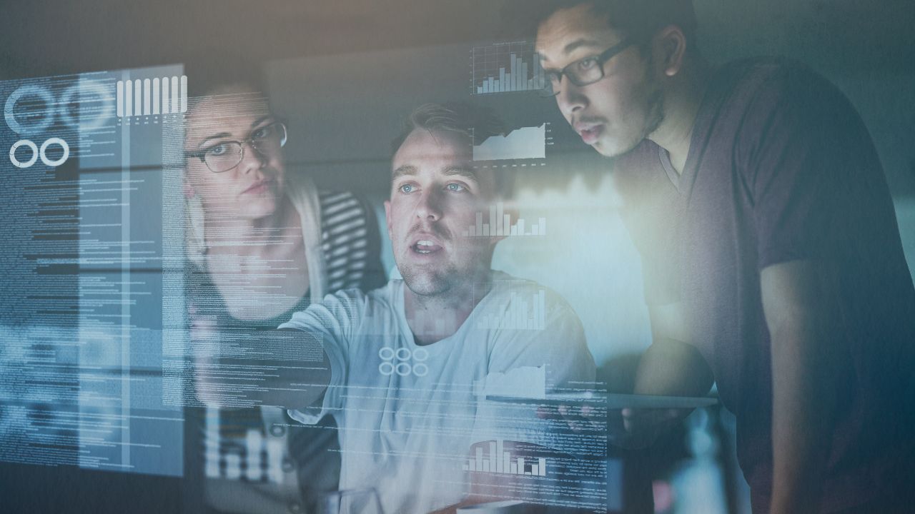 Team of data workers analyising metrics