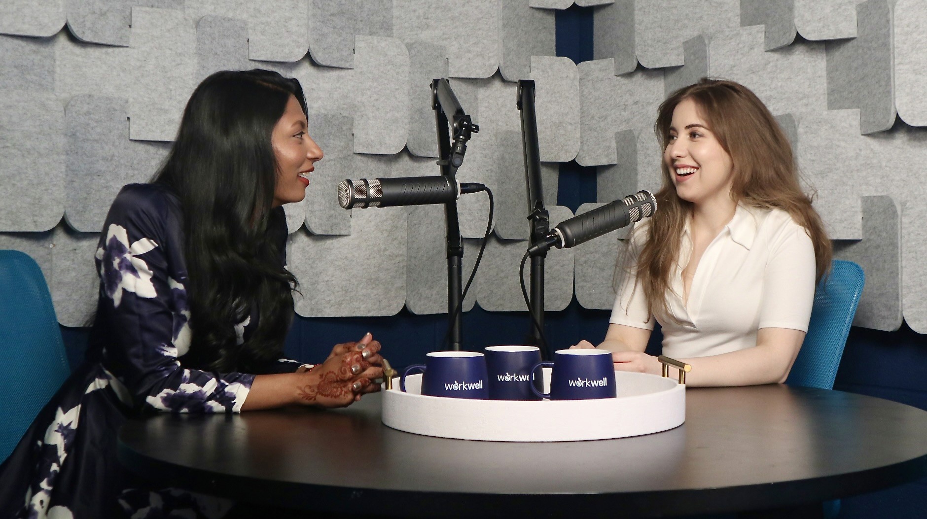 two women filming and recording a podcast episode