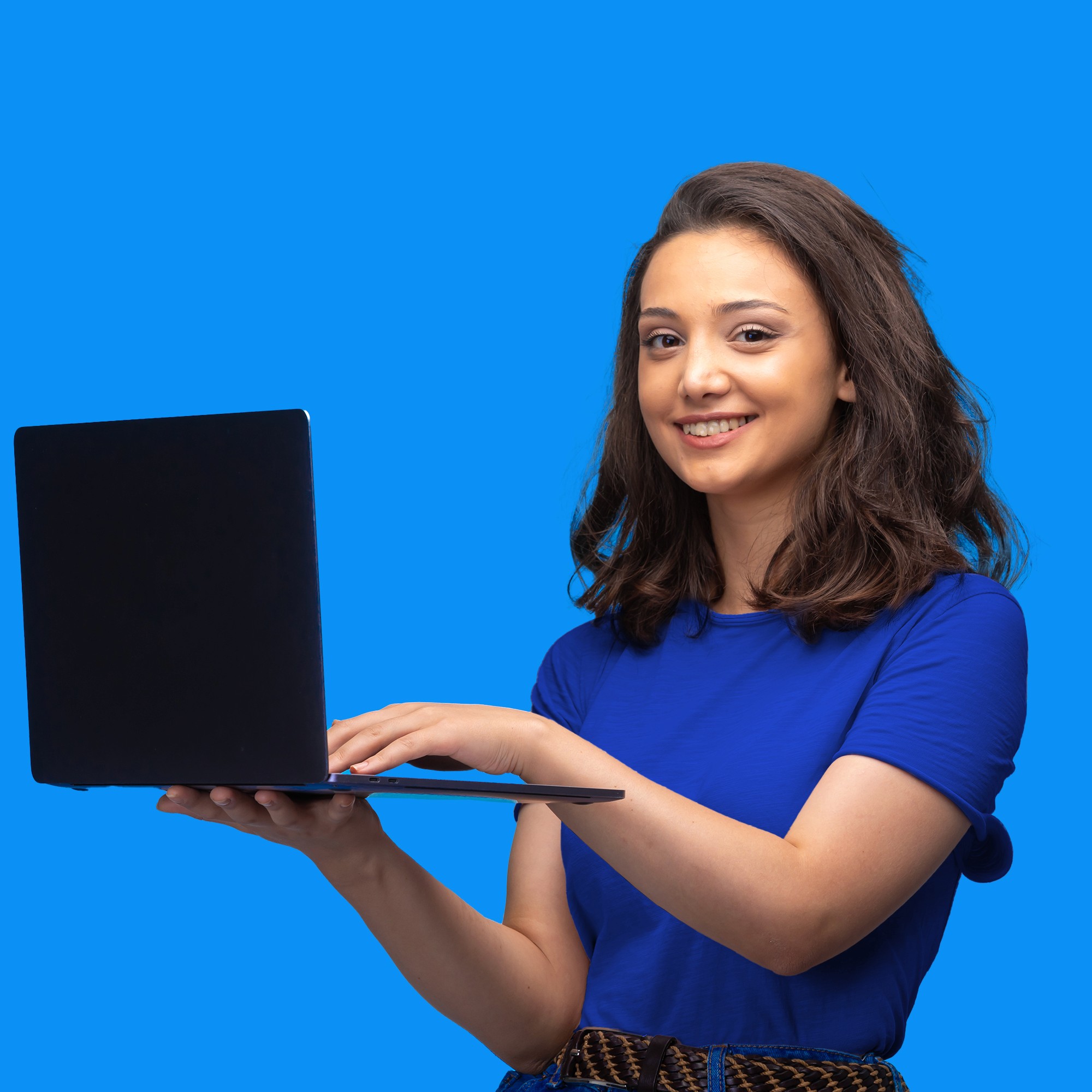 a person holding a laptop