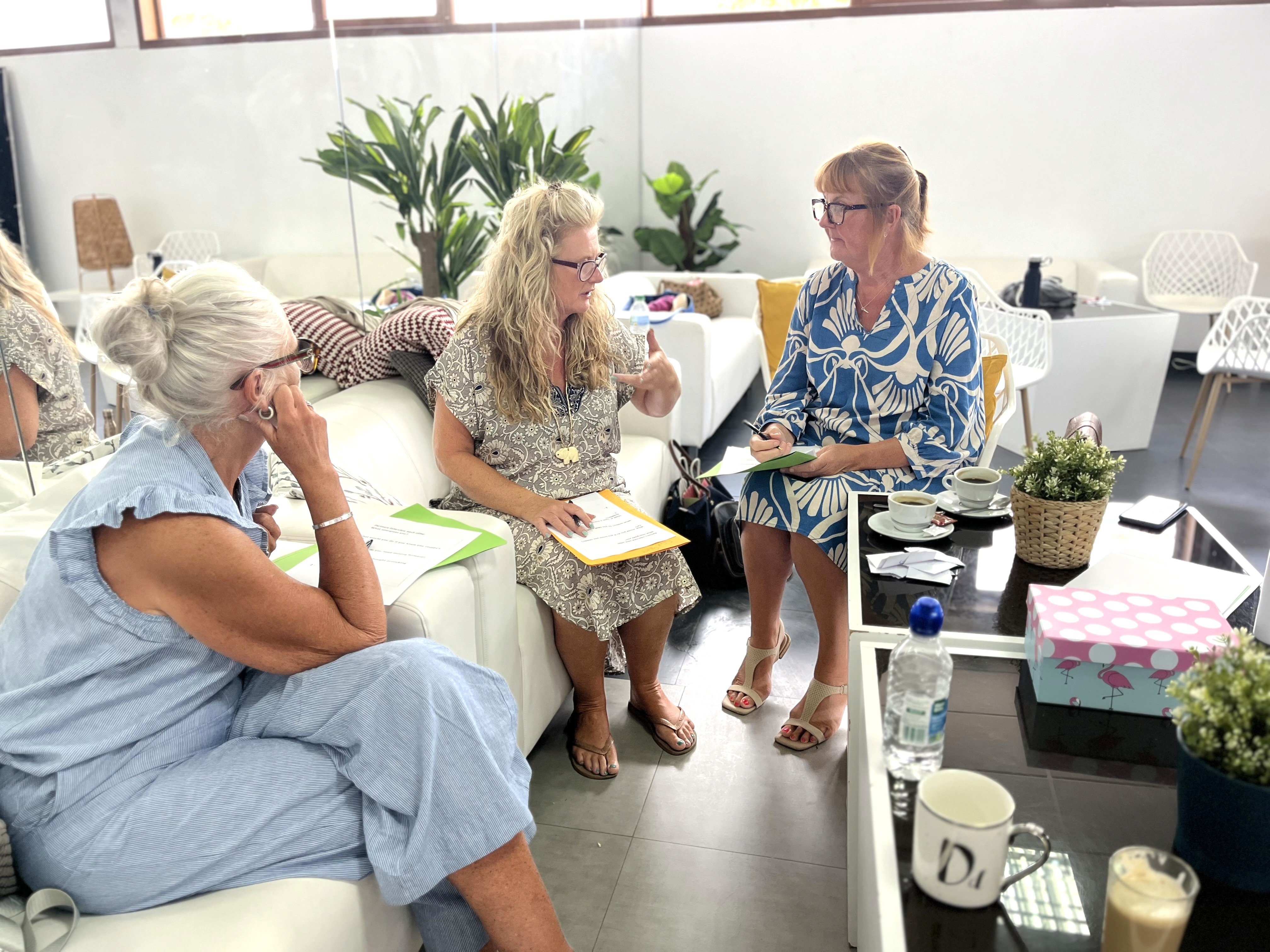 Three women at a workshop