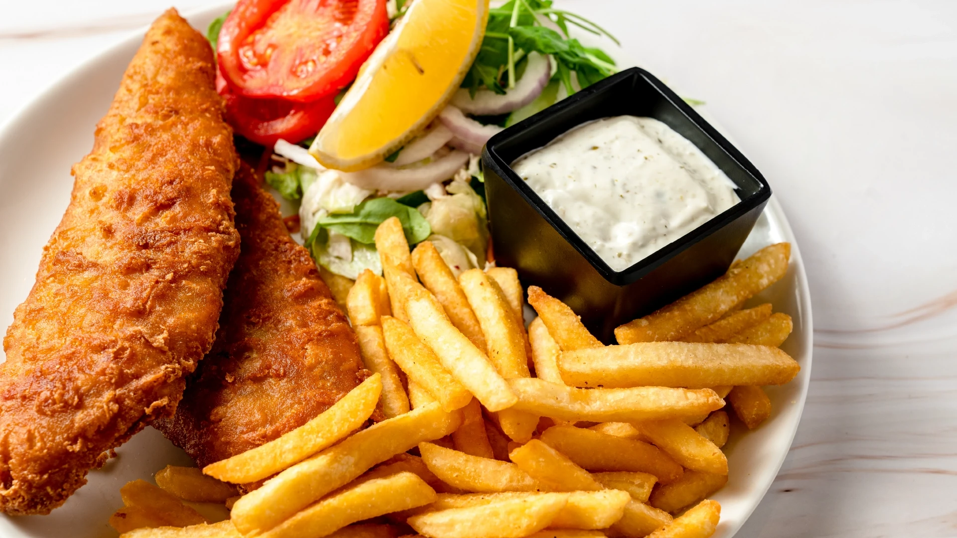 a vanilla ice cream with matcha cream served in a white plate