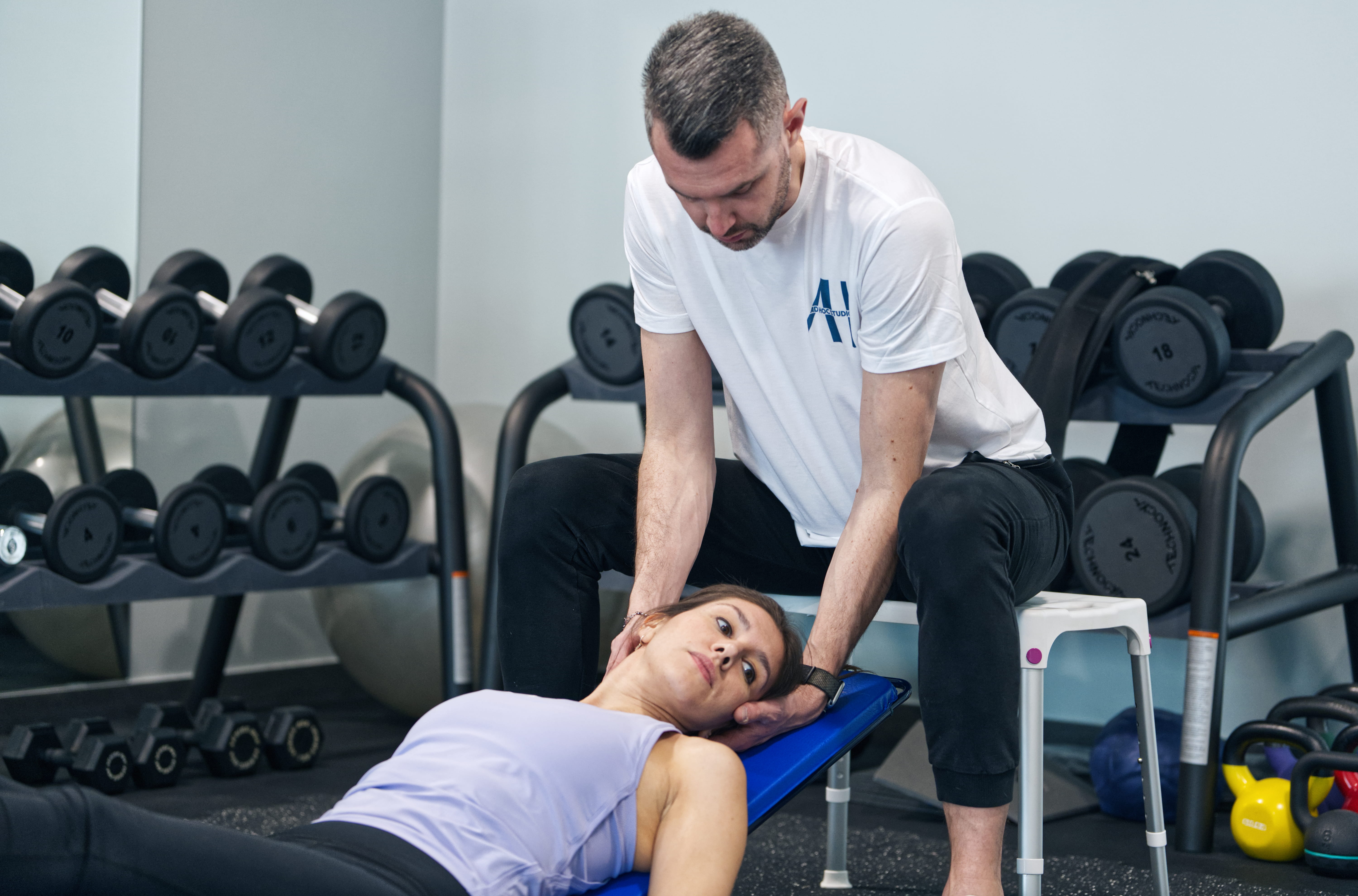 Futuristic glass tablet displaying a glowing blueprint-like interface against a dark background. It conveys a sleek, modern, and high-tech aesthetic.