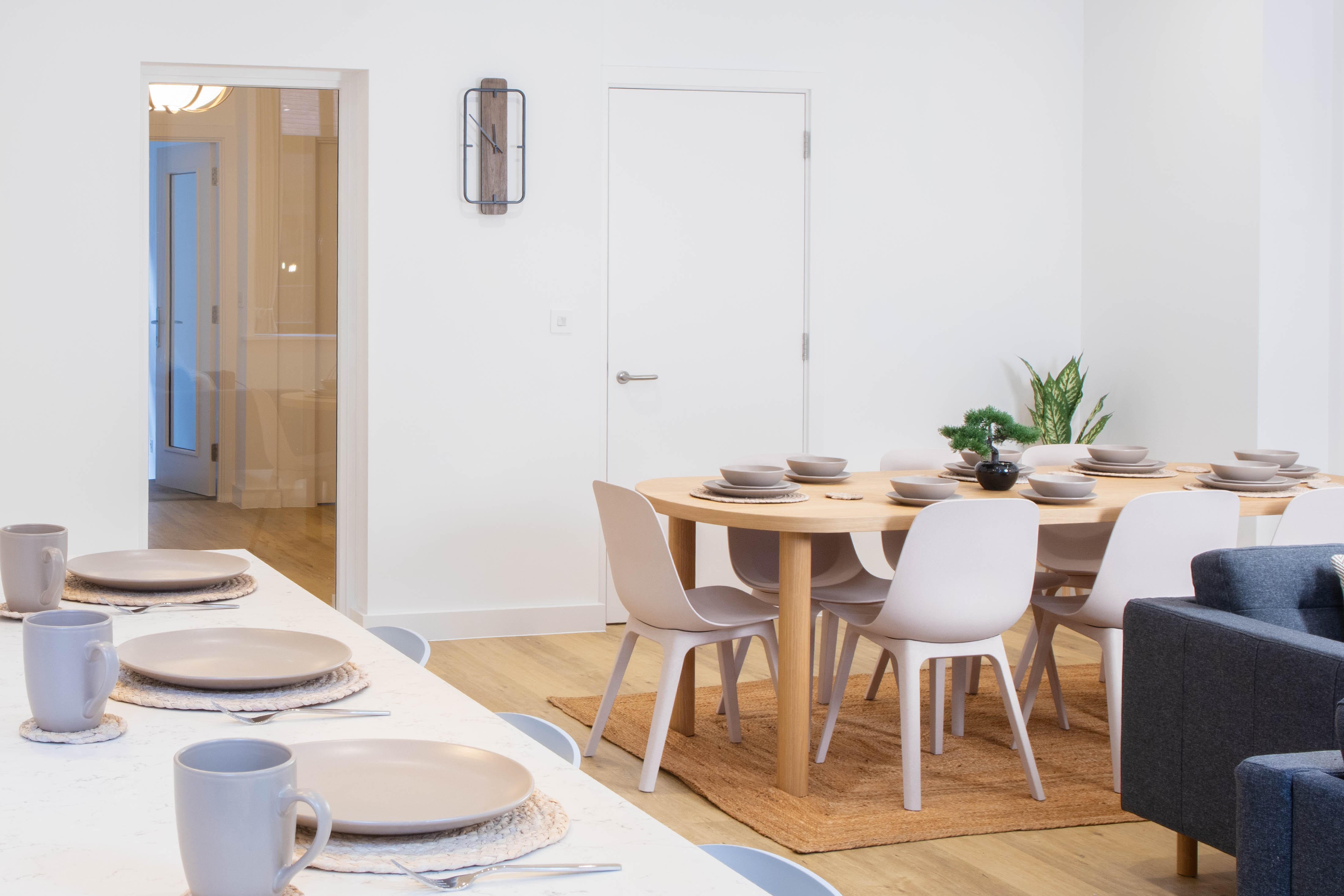 Modern bright living room with open plan dining area