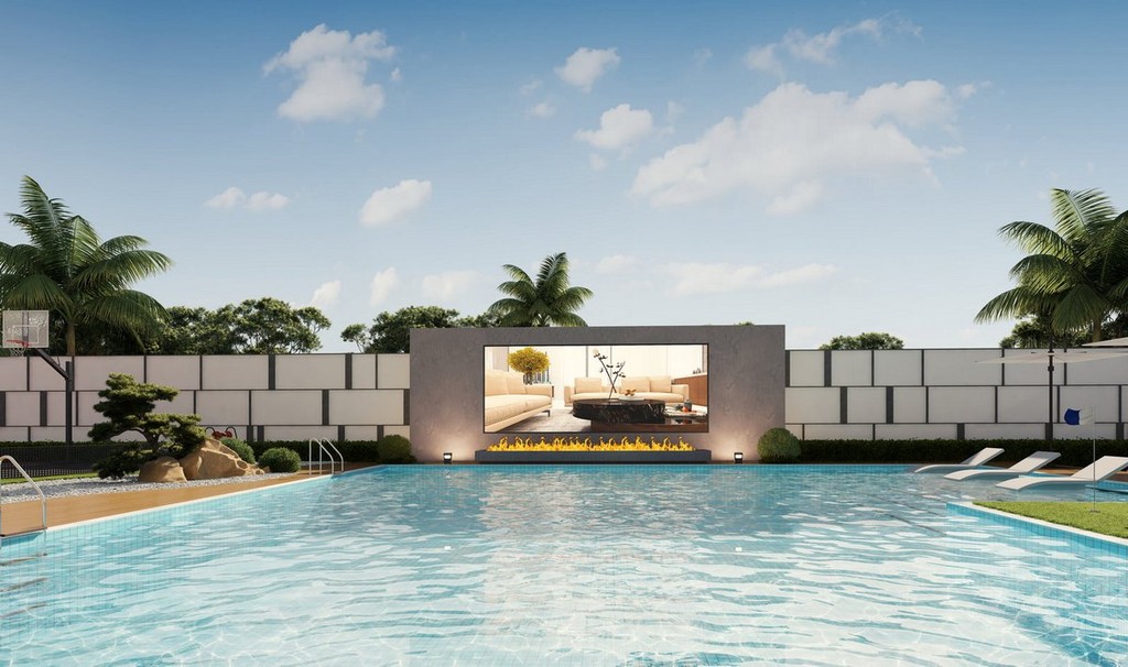 The Vue Doree Crystal Bay apartment building with a swimming pool in the foreground, highlighting modern design elements.