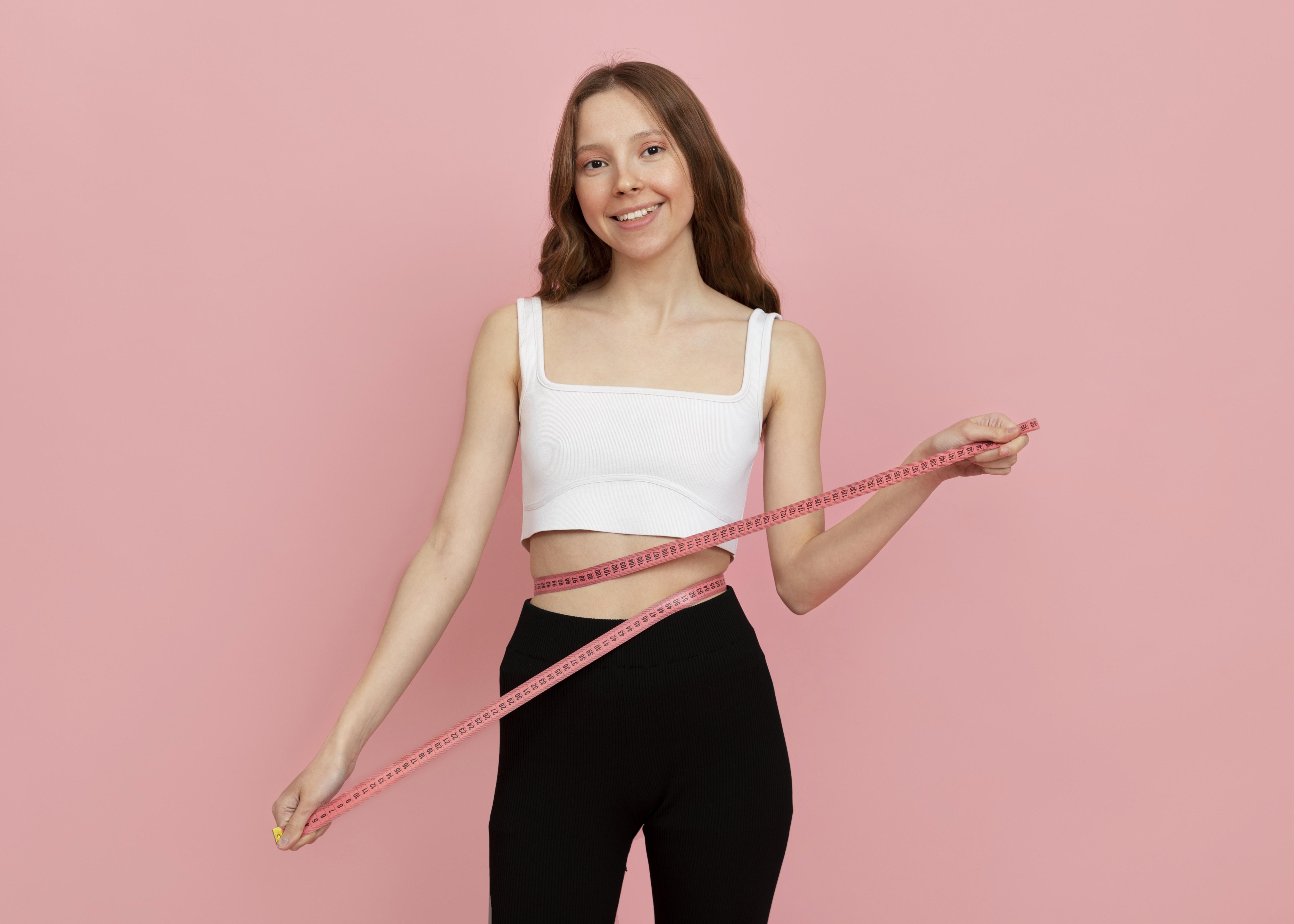 women measuring herself