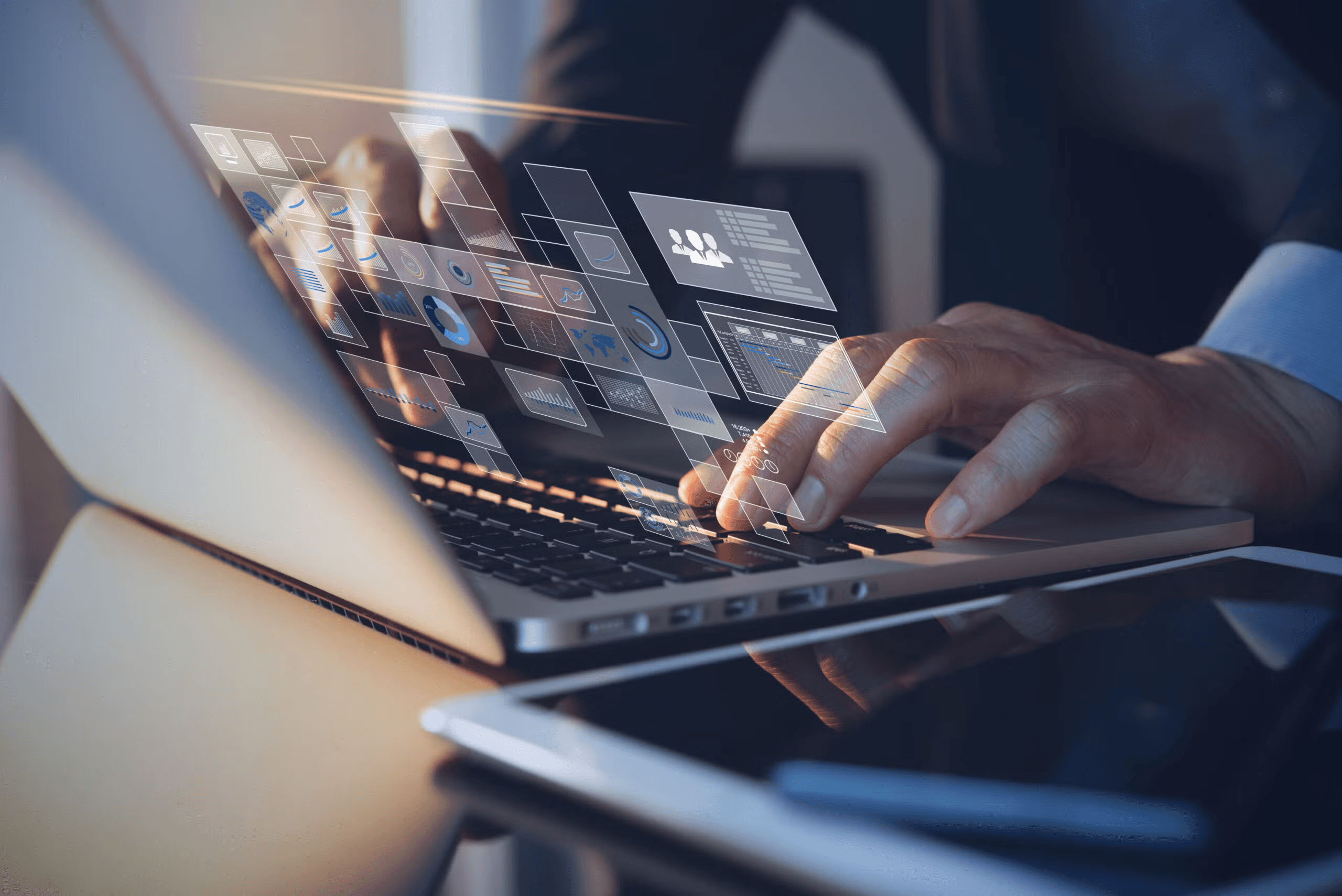 Digital data overlays above laptop keyboard - Birdeye Alternatives