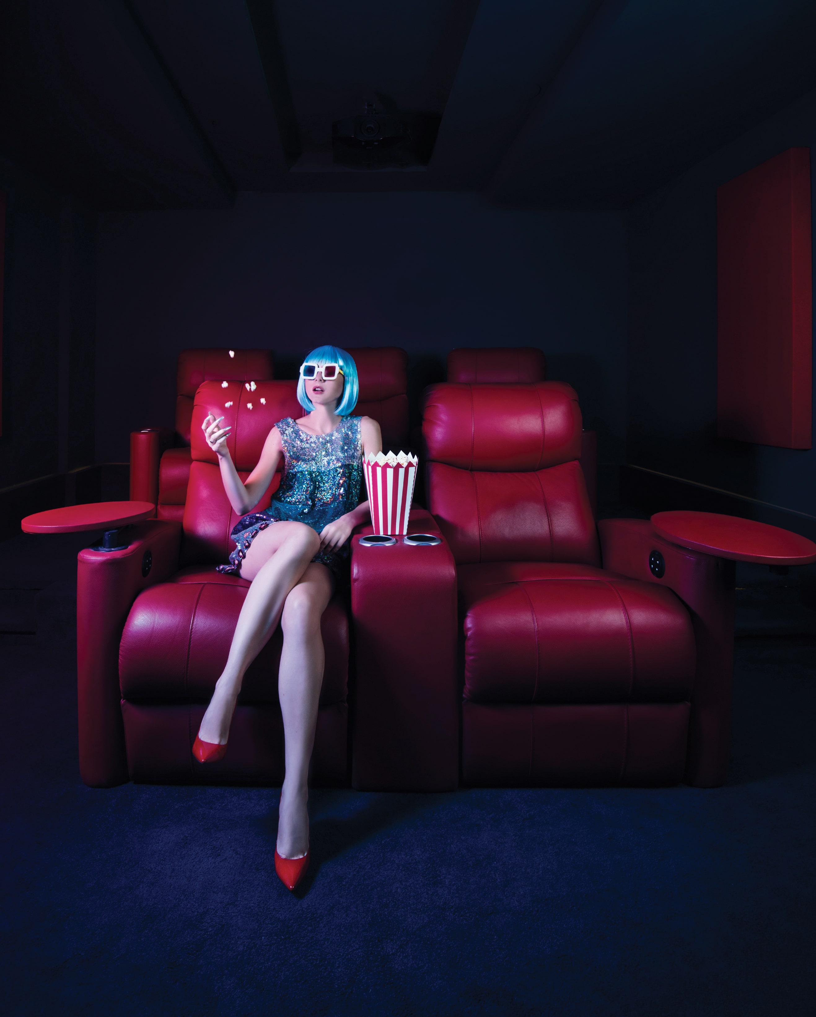 Group of friends smiling on a lively city street at night