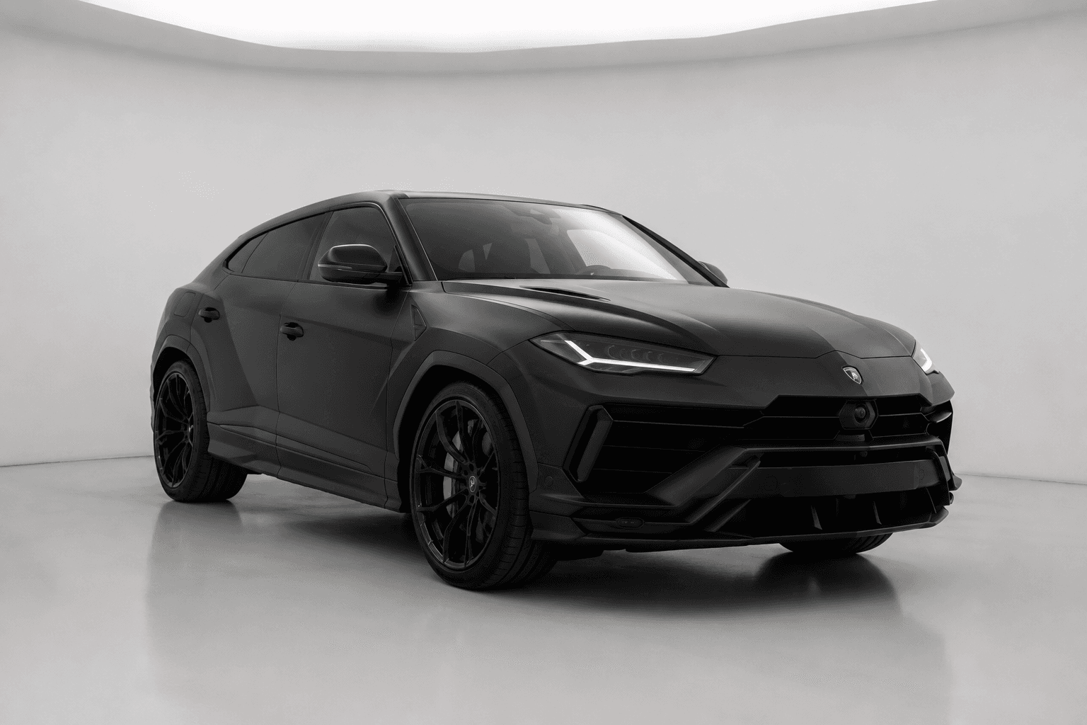 Matte black Lamborghini Urus SUV in studio