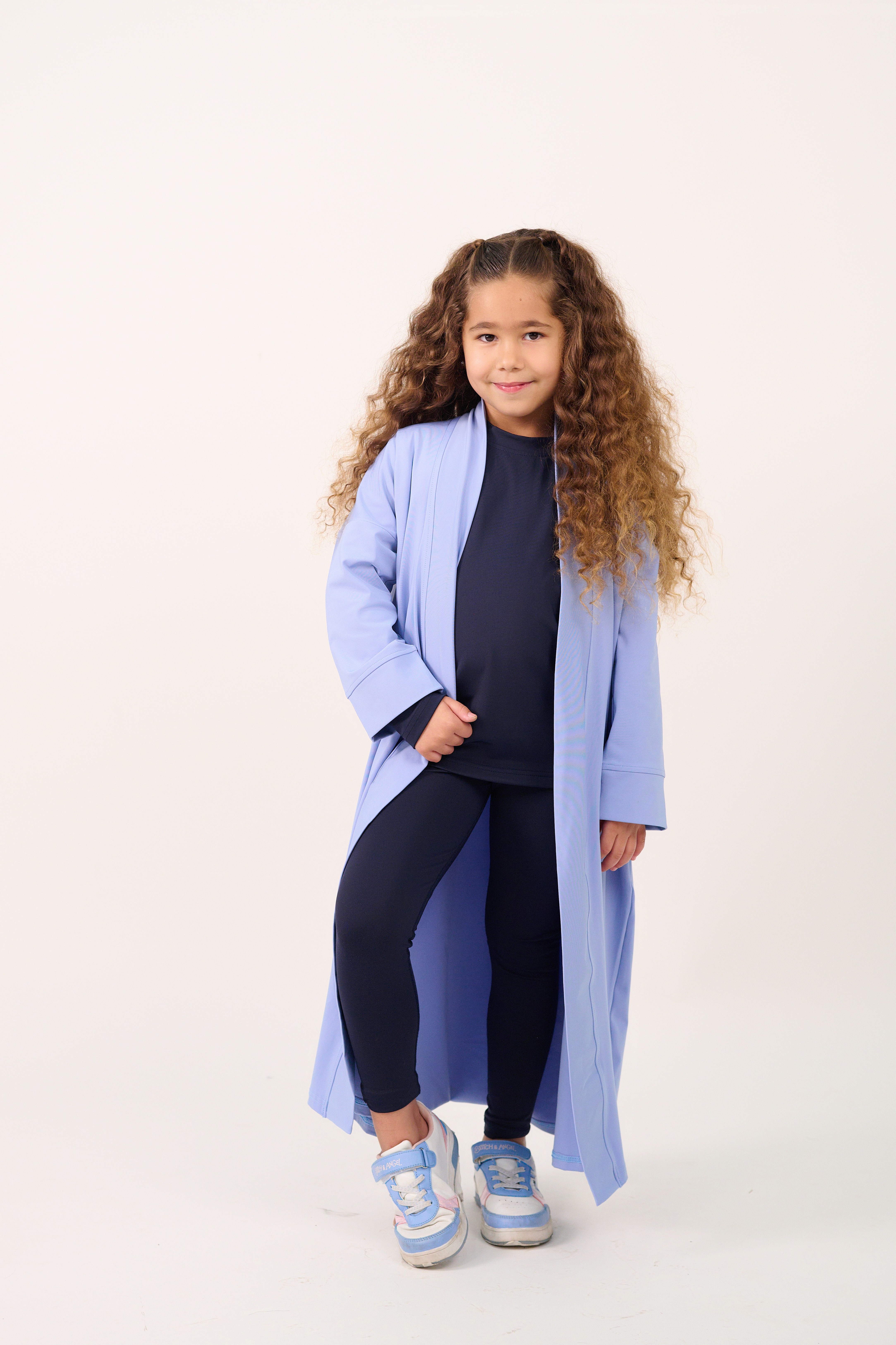 Friends laughing and posing inside a car