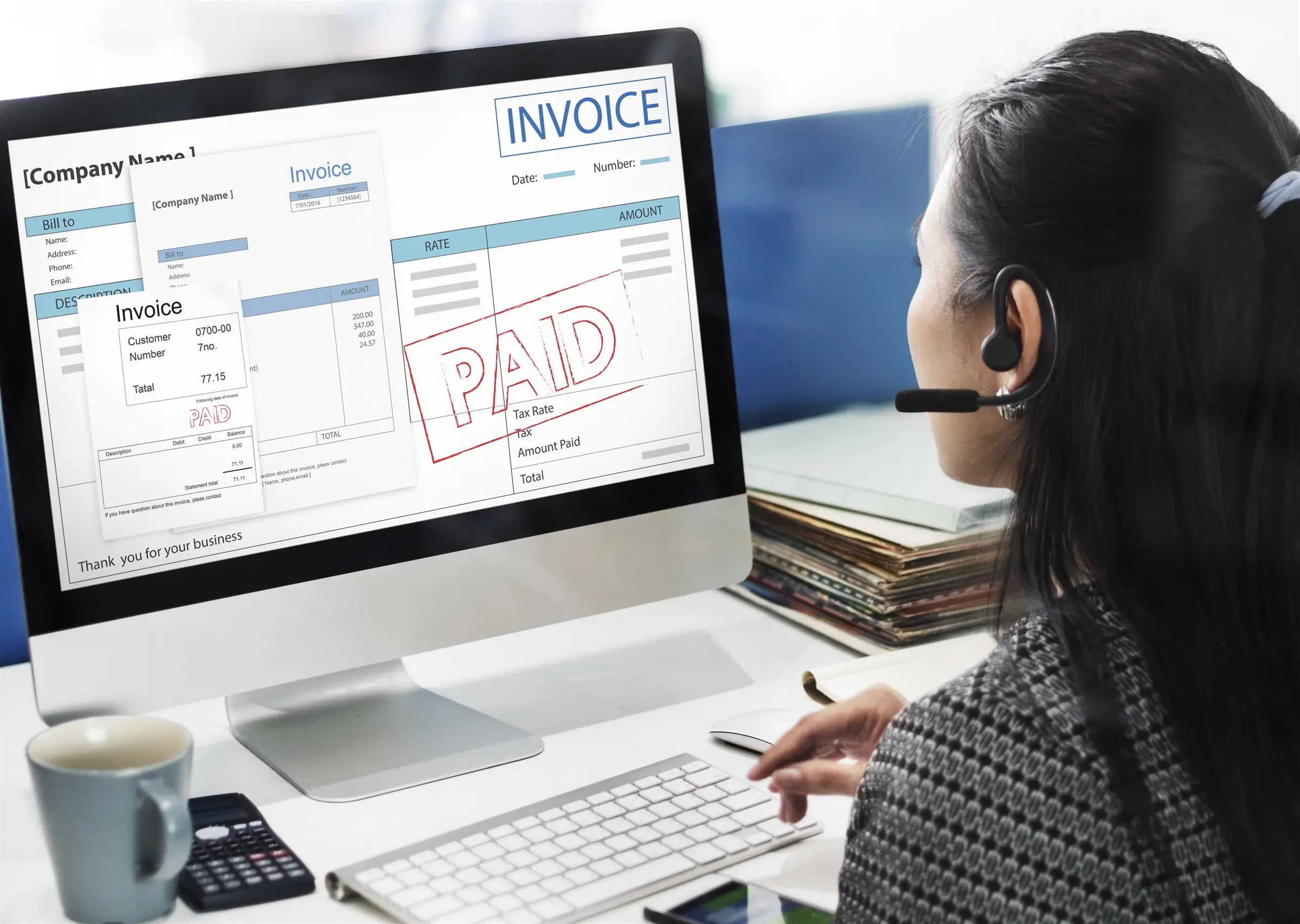 Invoice document open in processing software on a computer screen, KGT Solutions